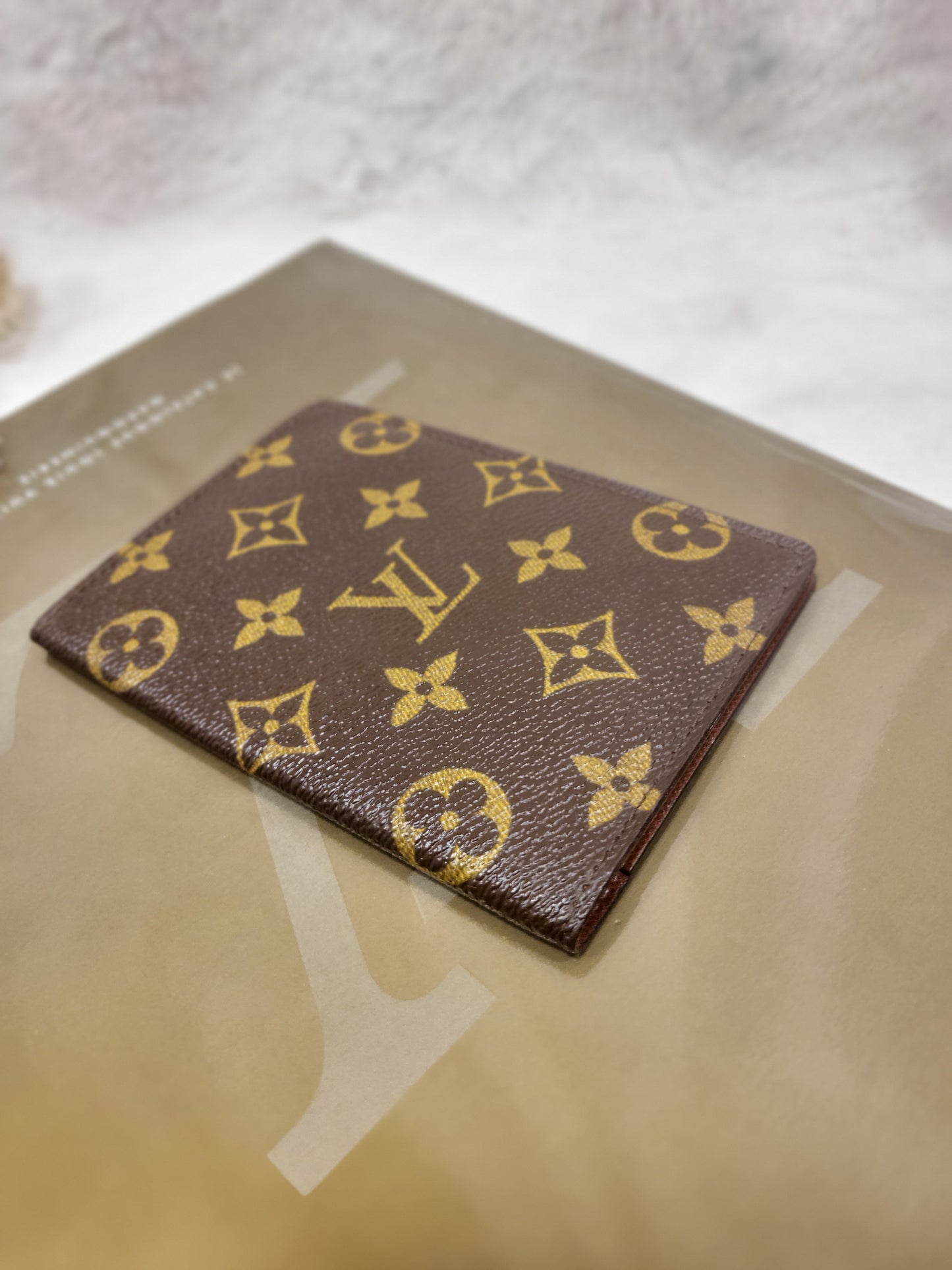 Authentic pre-owned Louis Vuitton passport holder