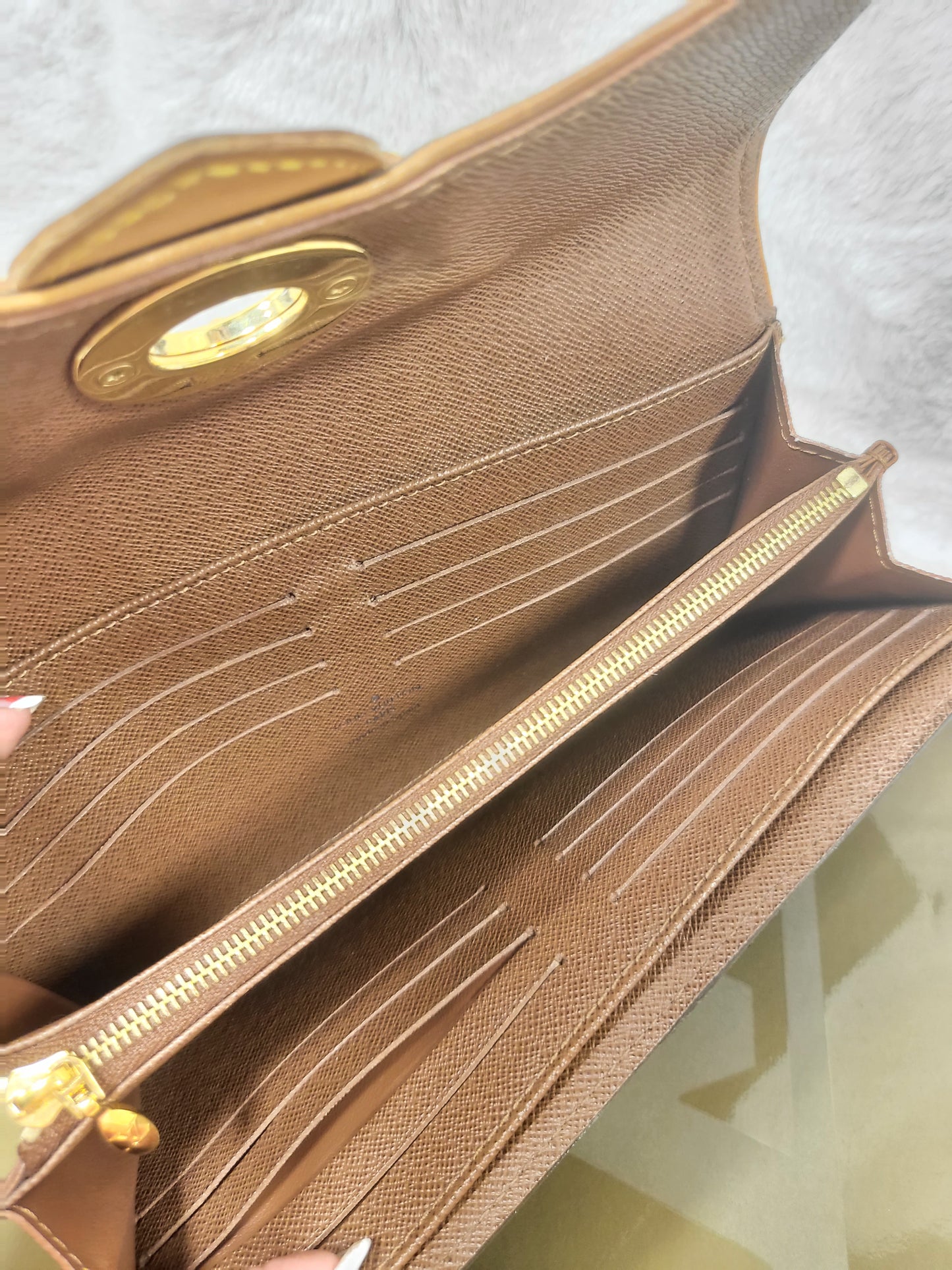 Authentic pre-owned Louis Vuitton Boetie wallet