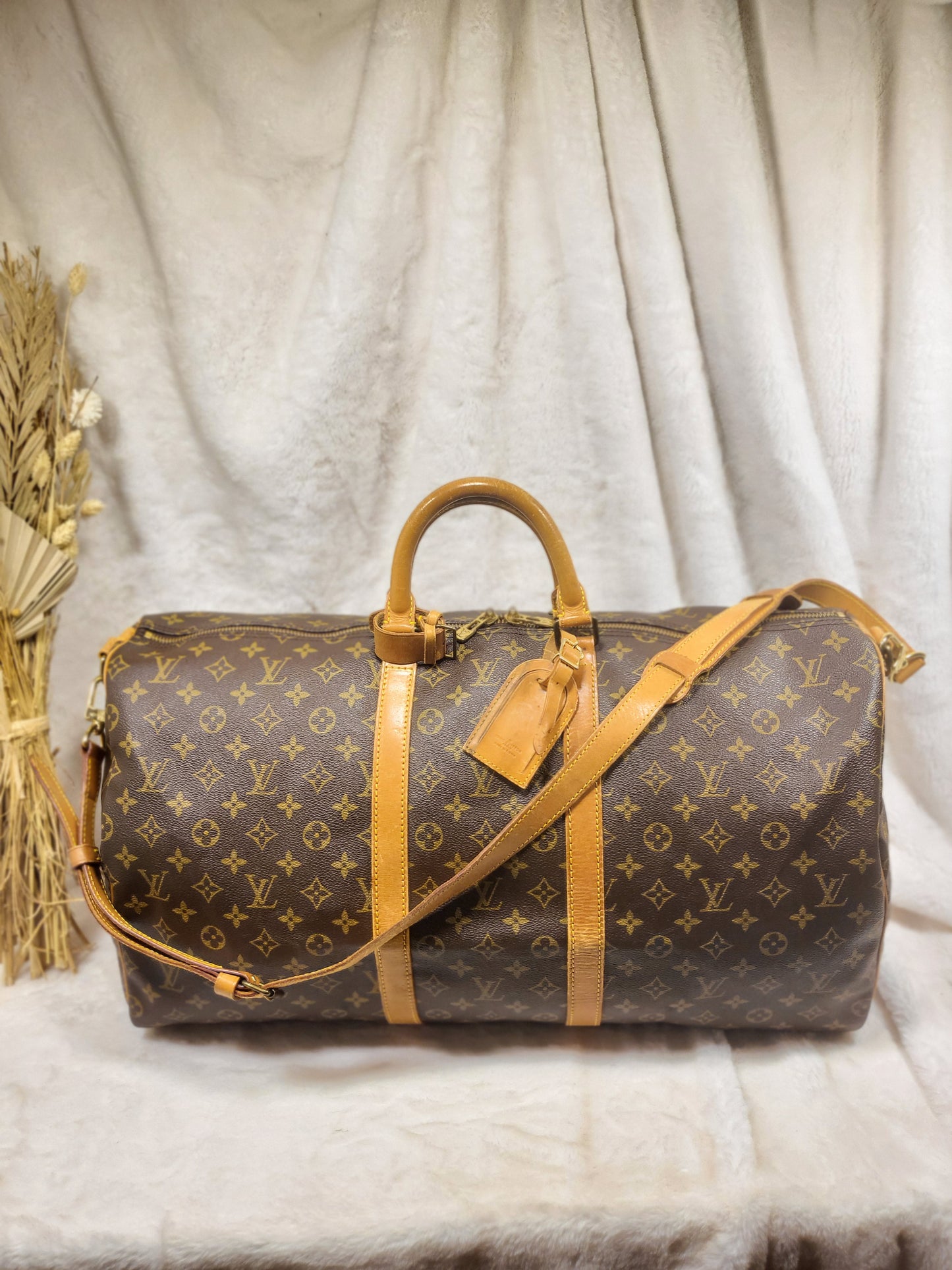 Authentic pre-owned Louis Vuitton Keepall 55 bandoliere