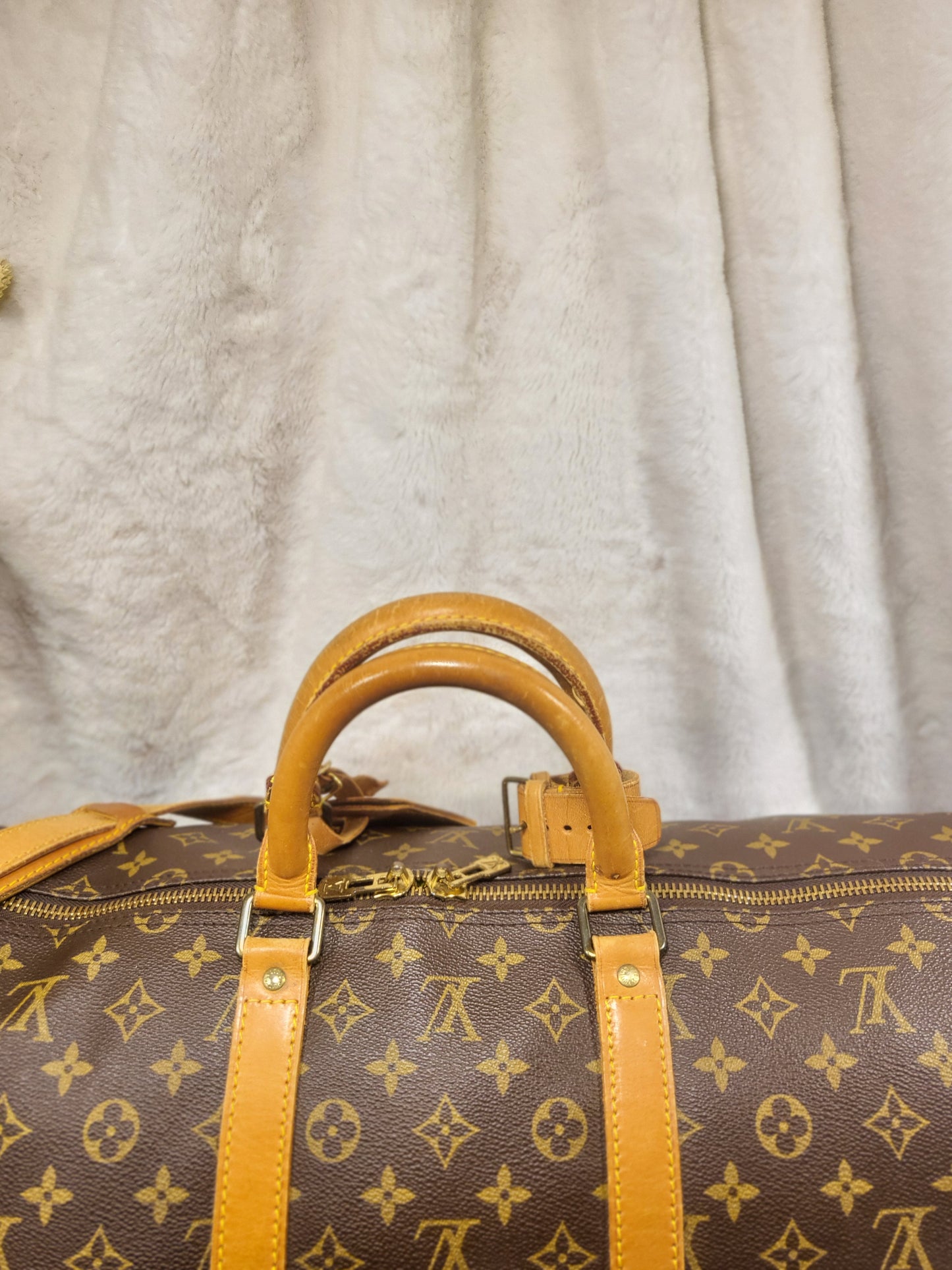 Authentic pre-owned Louis Vuitton Keepall 55 bandoliere