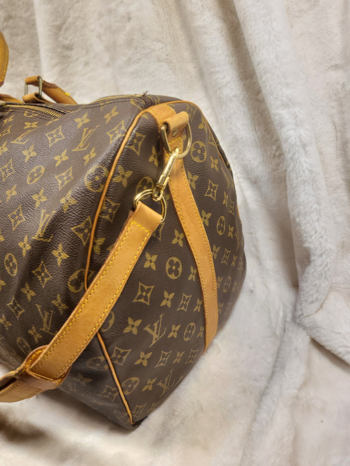 Authentic pre-owned Louis Vuitton Keepall 55 bandoliere