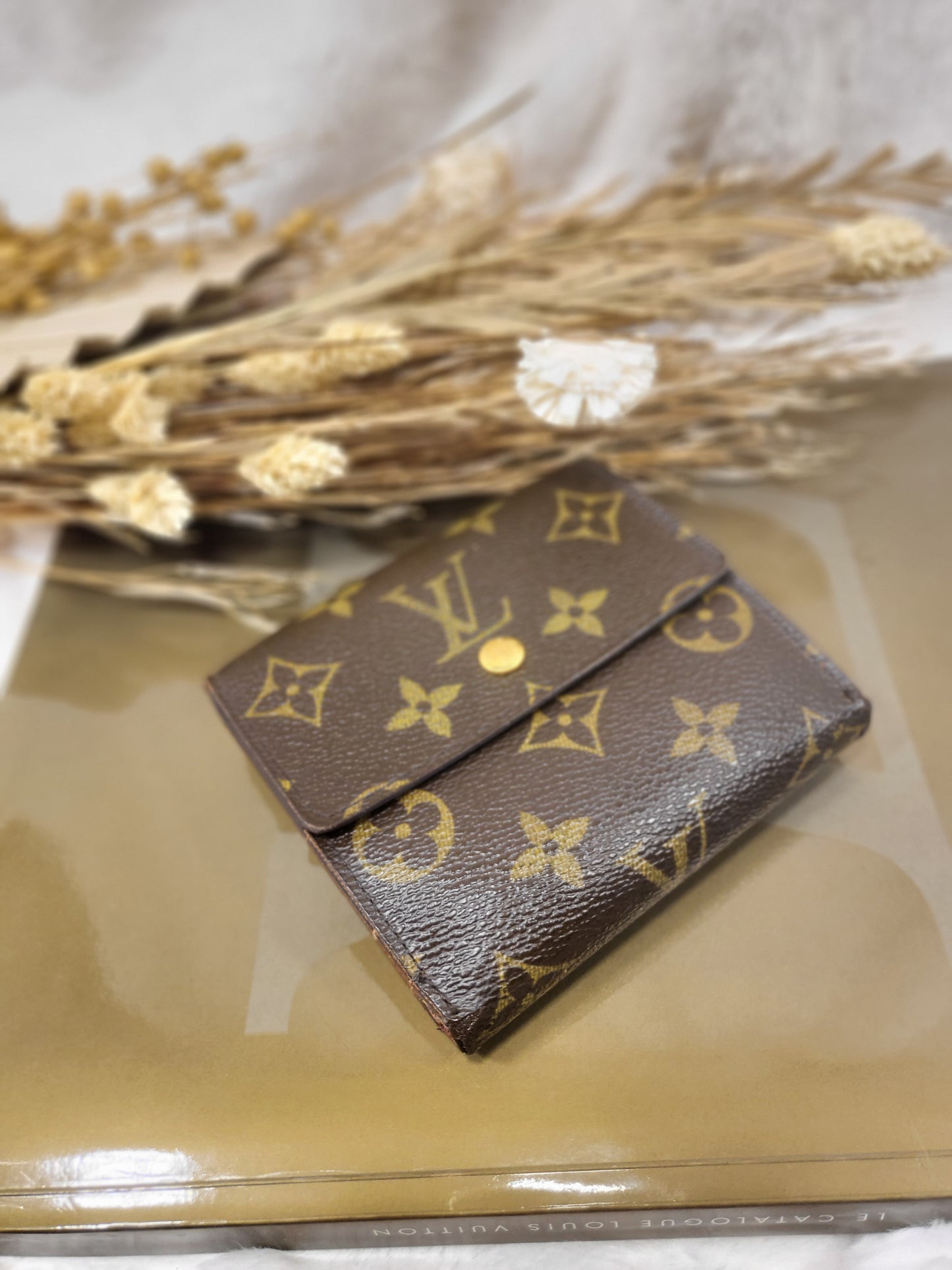 Authentic pre-owned Louis Vuitton Elise Trifold wallet