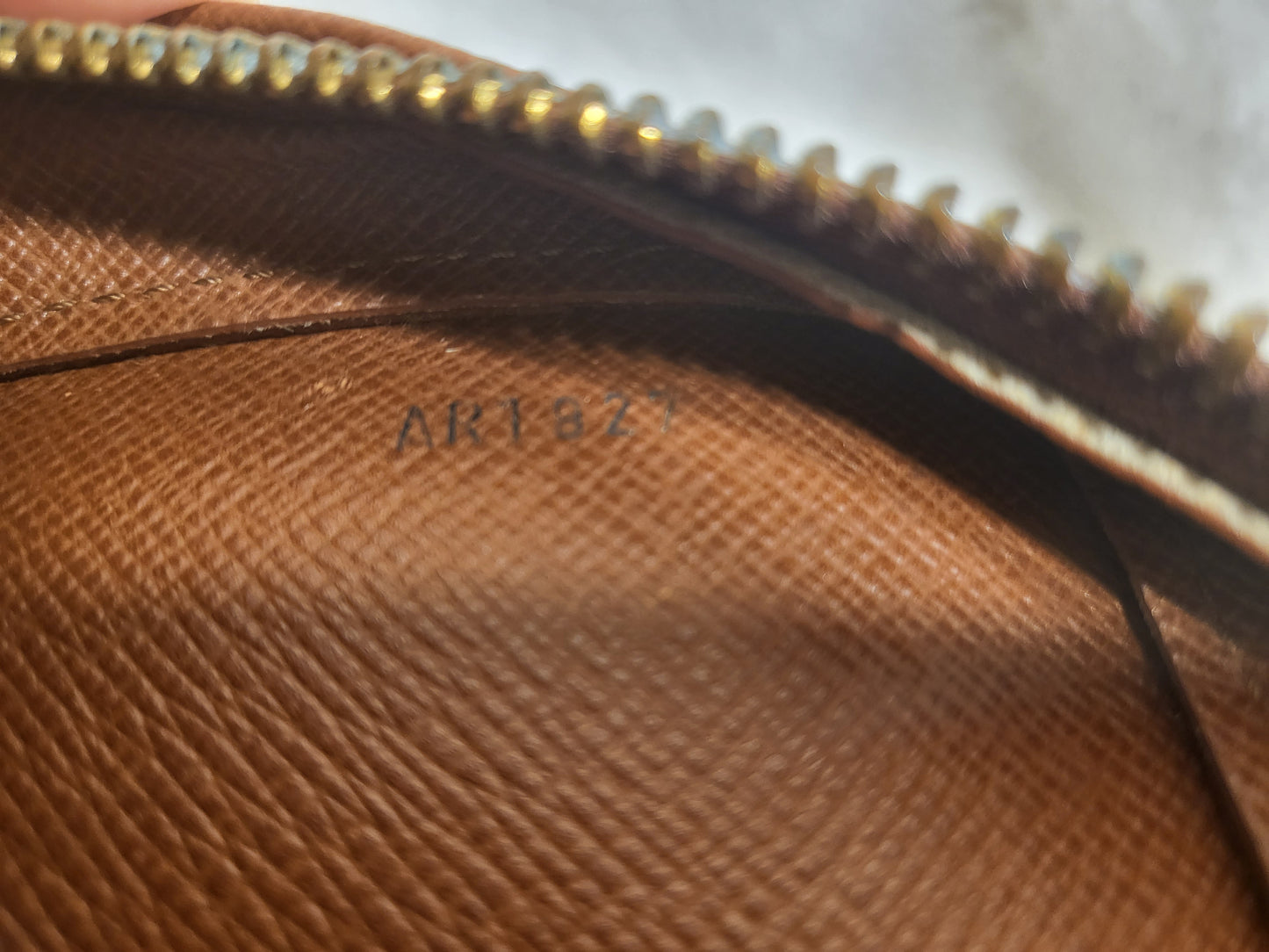Authentic pre-owned Louis Vuitton Orsay monogram clutch