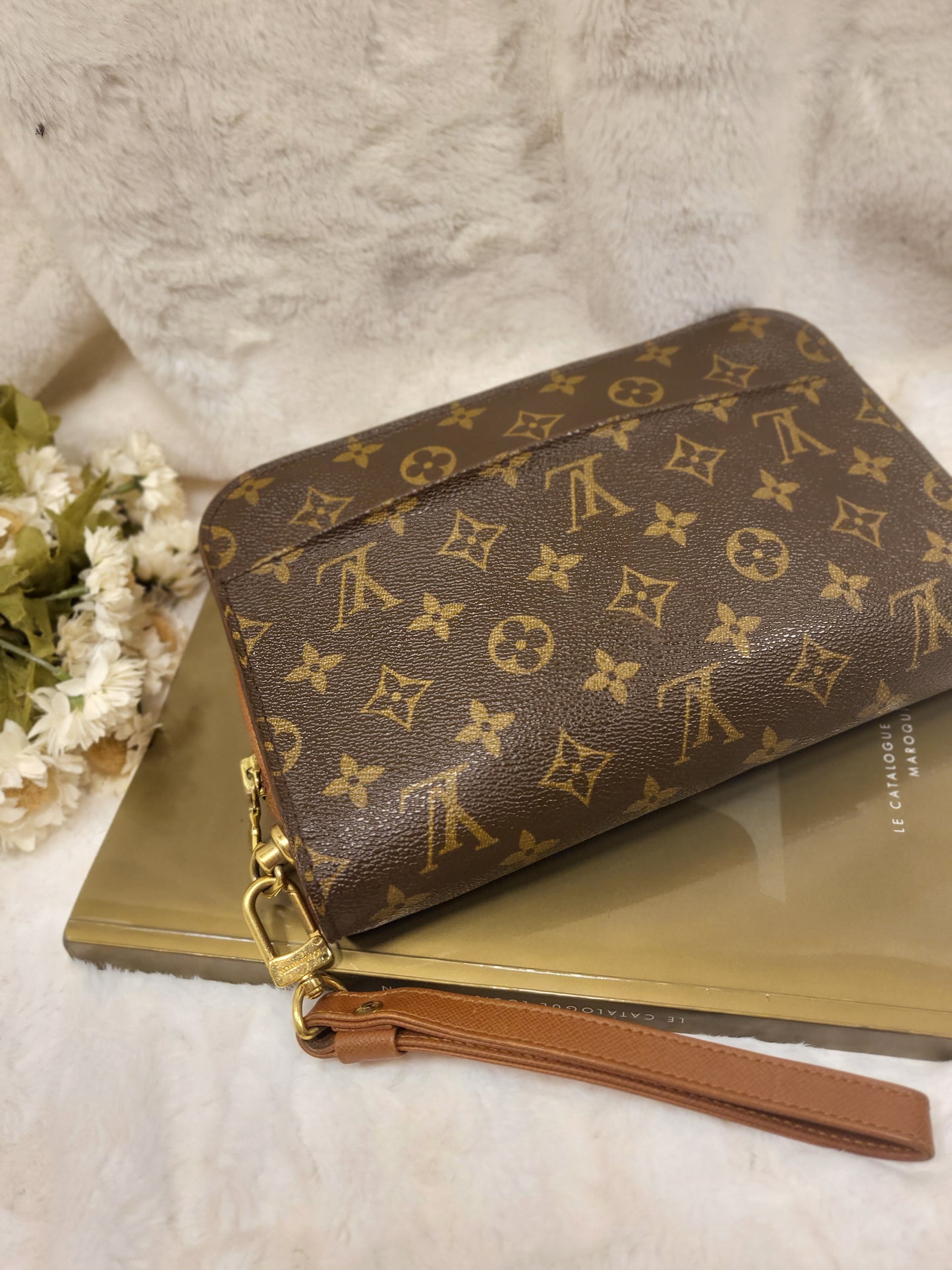 Authentic pre-owned Louis Vuitton Orsay monogram clutch