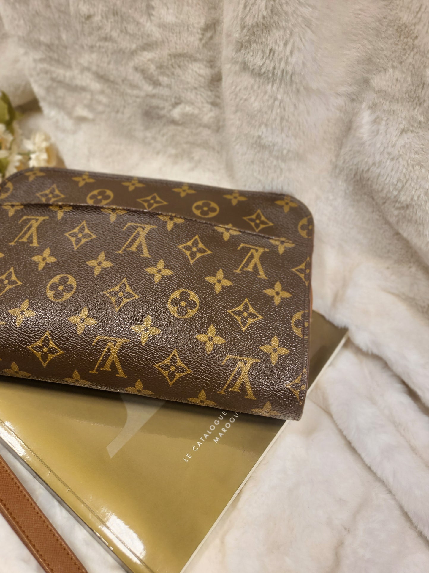 Authentic pre-owned Louis Vuitton Orsay monogram clutch