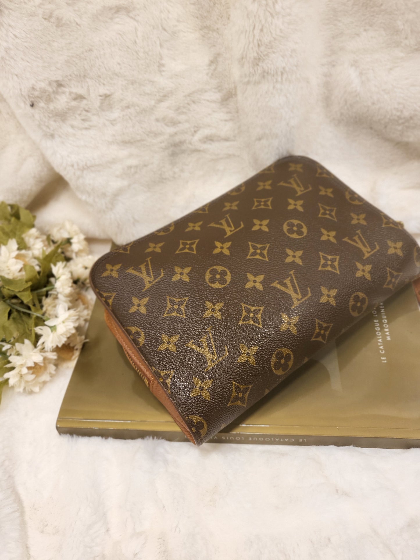 Authentic pre-owned Louis Vuitton Orsay monogram clutch
