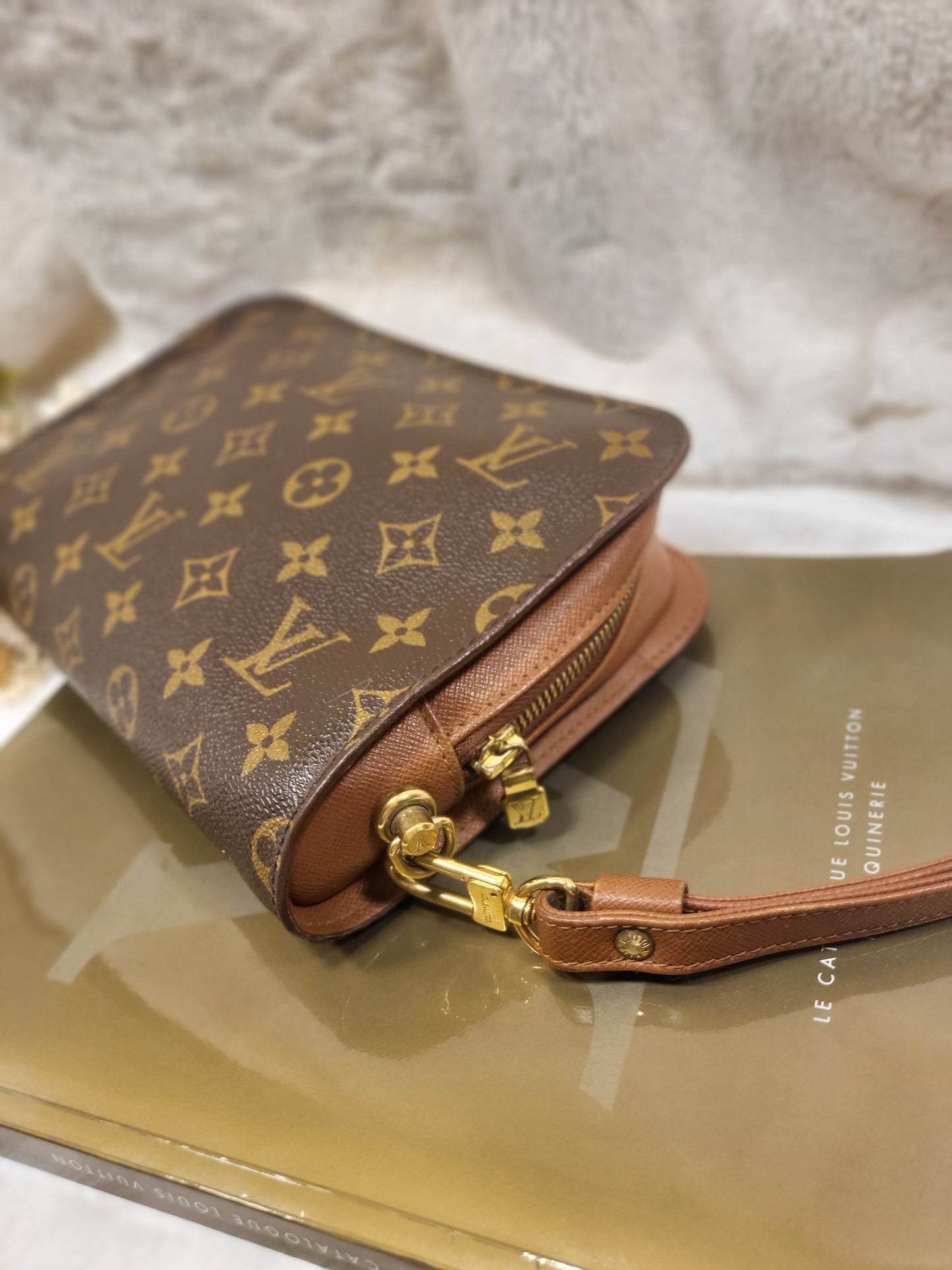 Authentic pre-owned Louis Vuitton Orsay monogram clutch