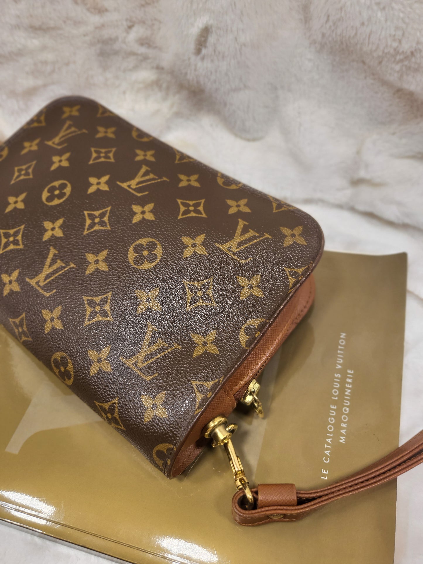 Authentic pre-owned Louis Vuitton Orsay monogram clutch