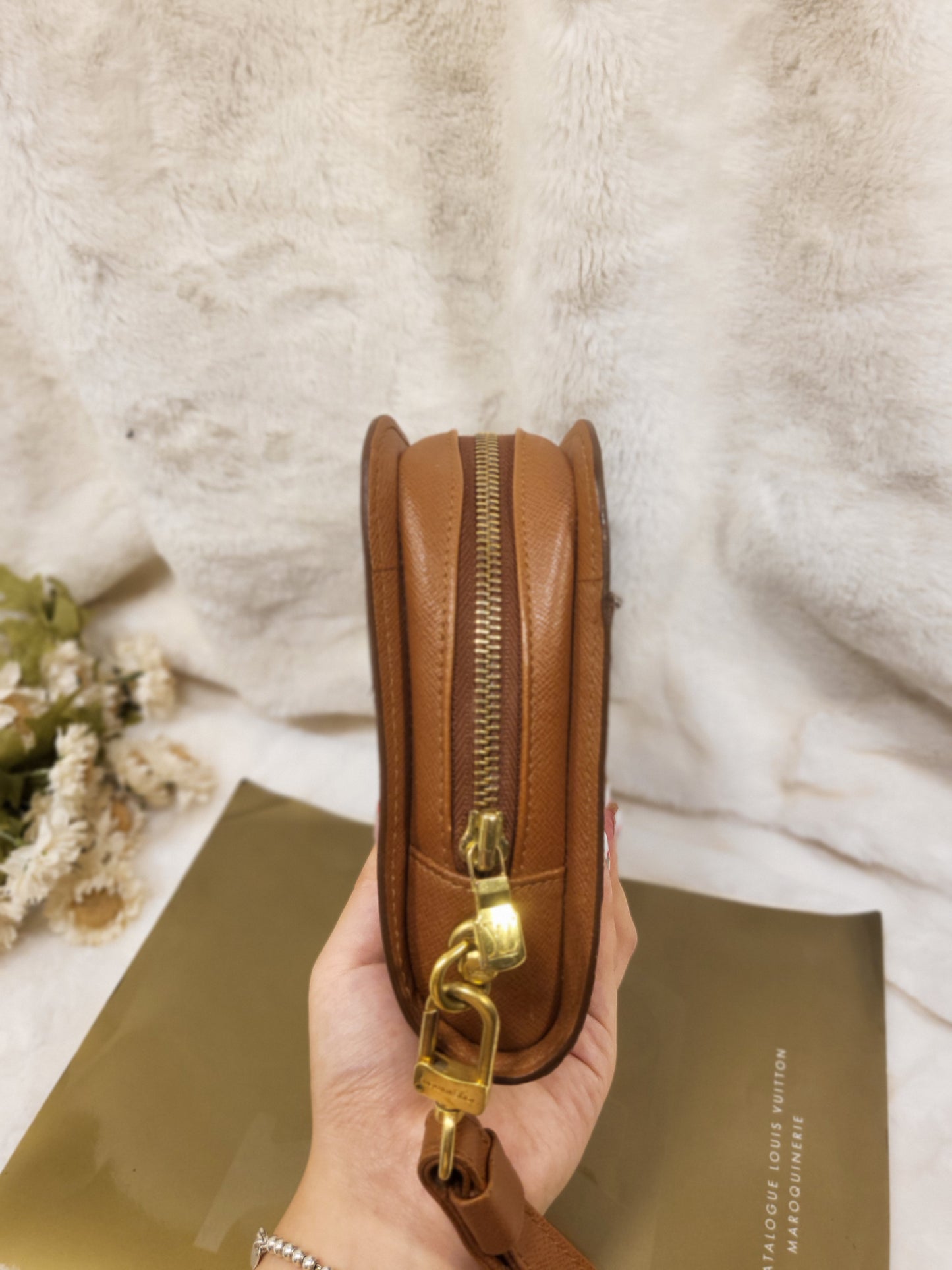 Authentic pre-owned Louis Vuitton Orsay monogram clutch