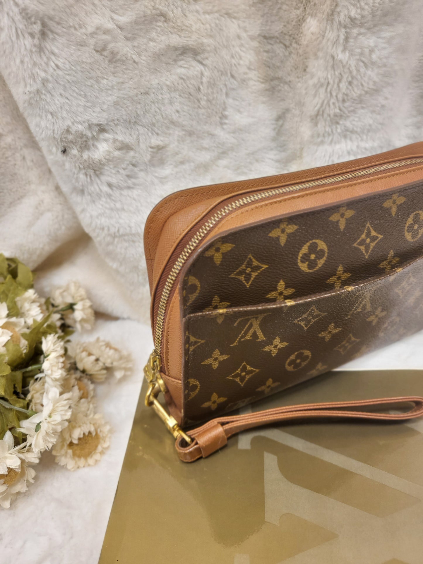 Authentic pre-owned Louis Vuitton Orsay monogram clutch