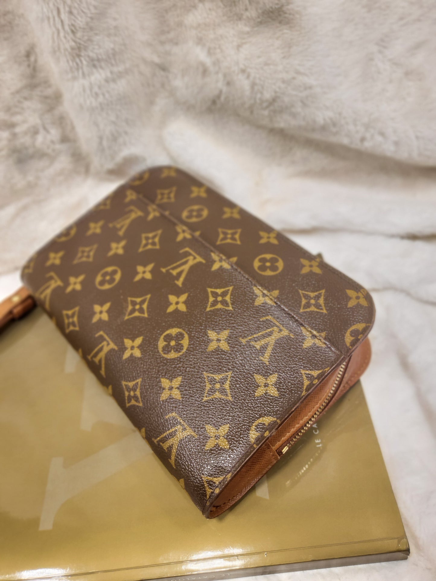Authentic pre-owned Louis Vuitton Orsay monogram clutch