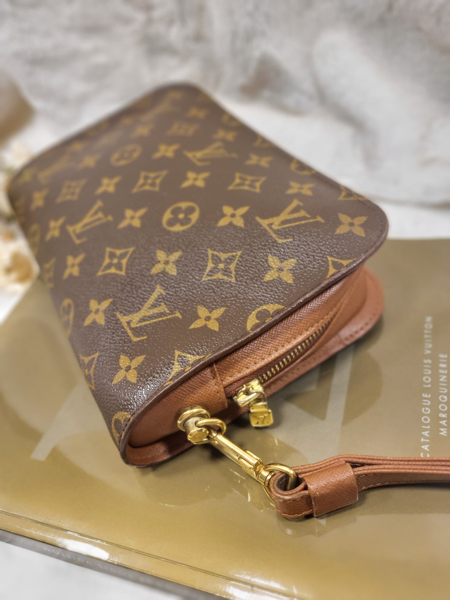 Authentic pre-owned Louis Vuitton Orsay monogram clutch