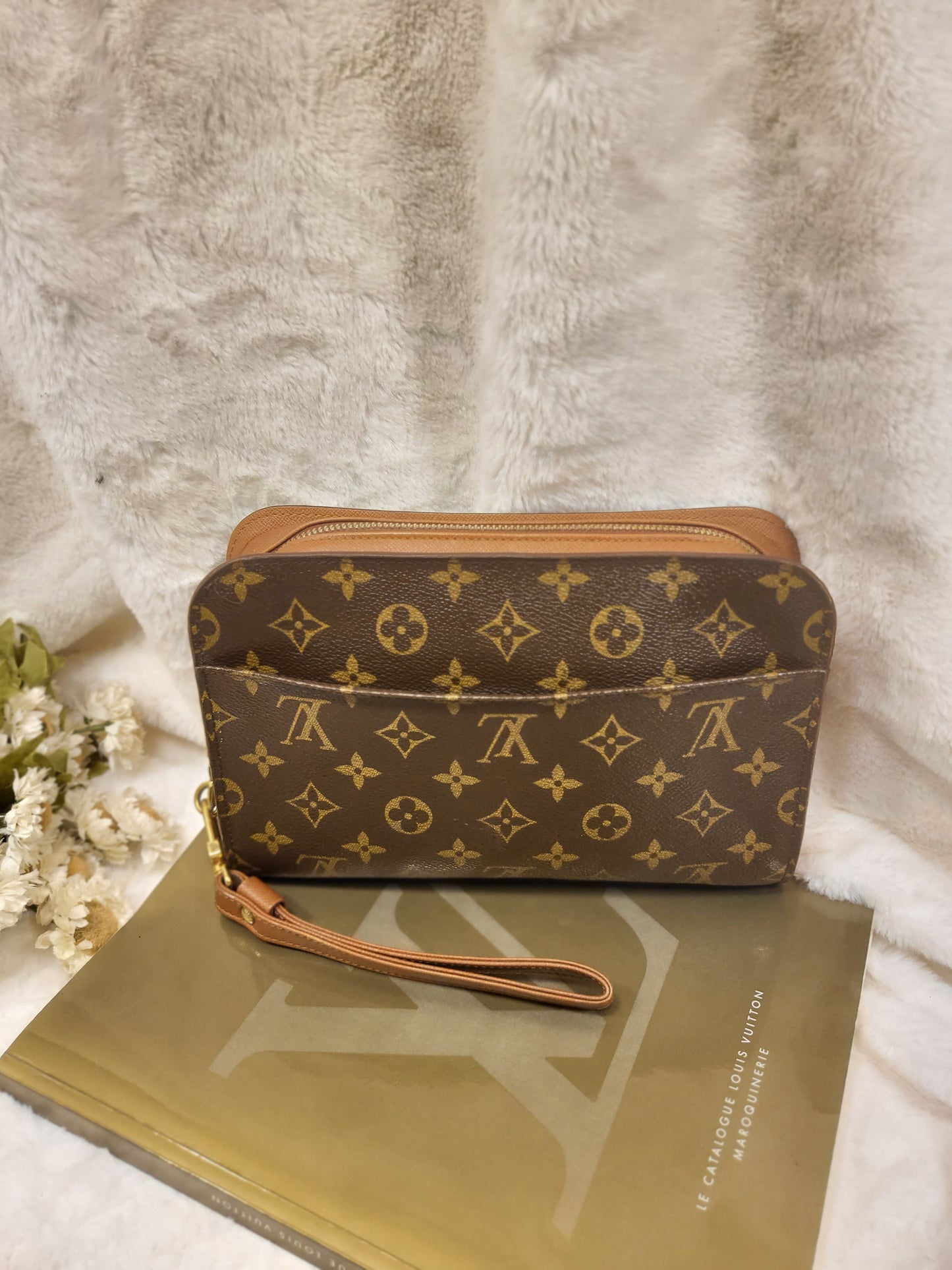 Authentic pre-owned Louis Vuitton Orsay monogram clutch