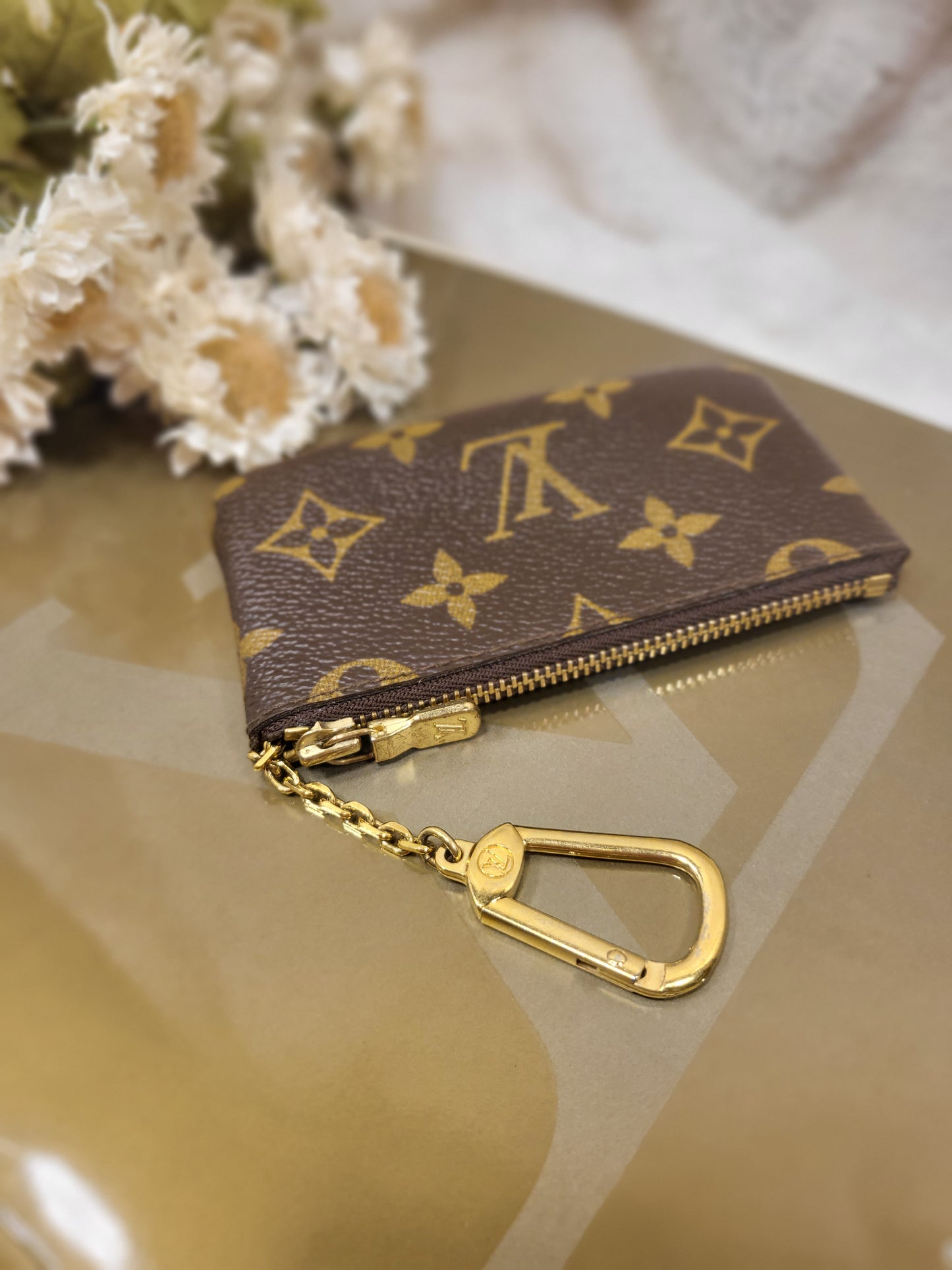 Authentic pre-owned Louis Vuitton Key cle pouch