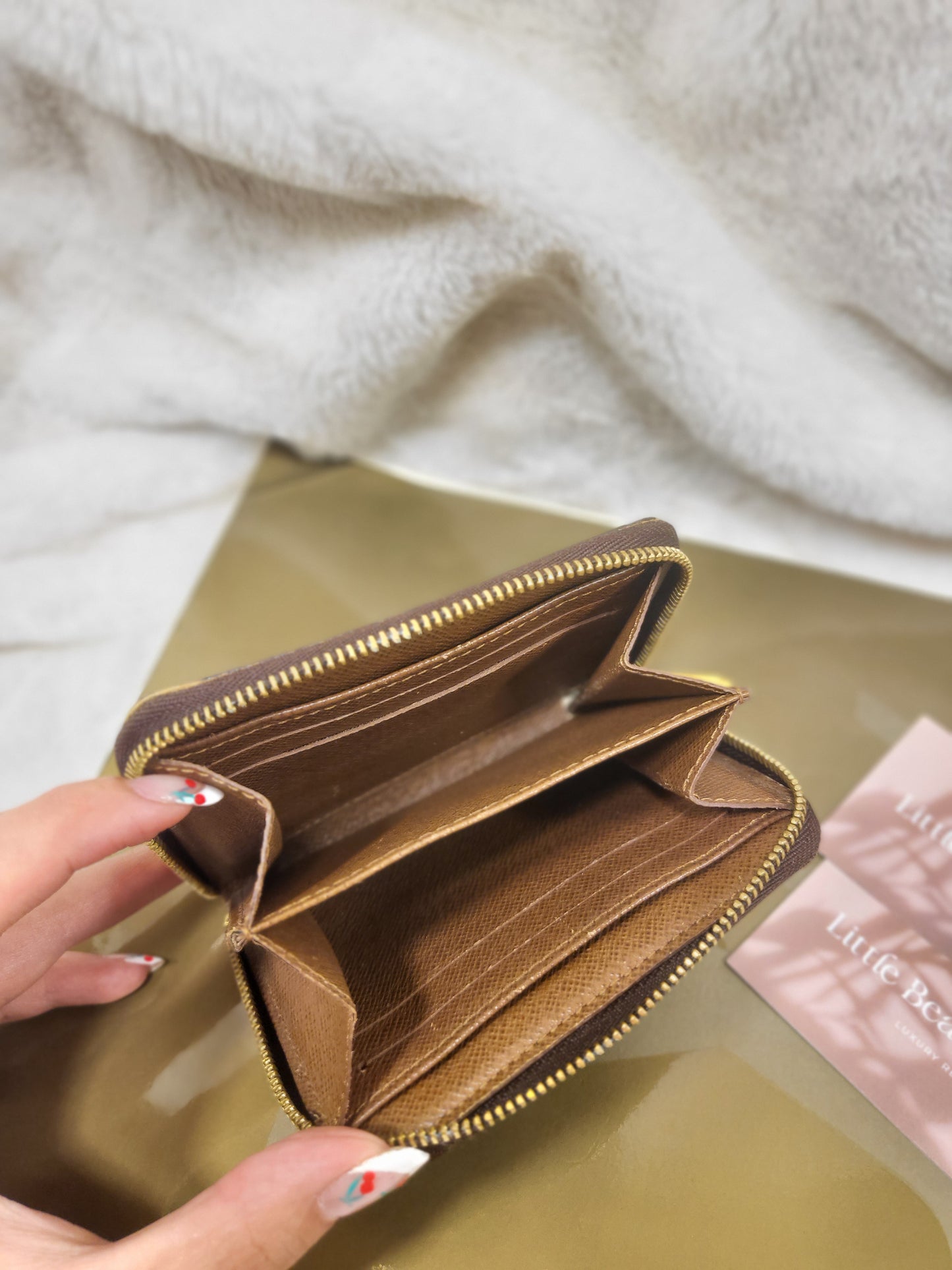 Authentic pre-owned Louis Vuitton compact zippy wallet