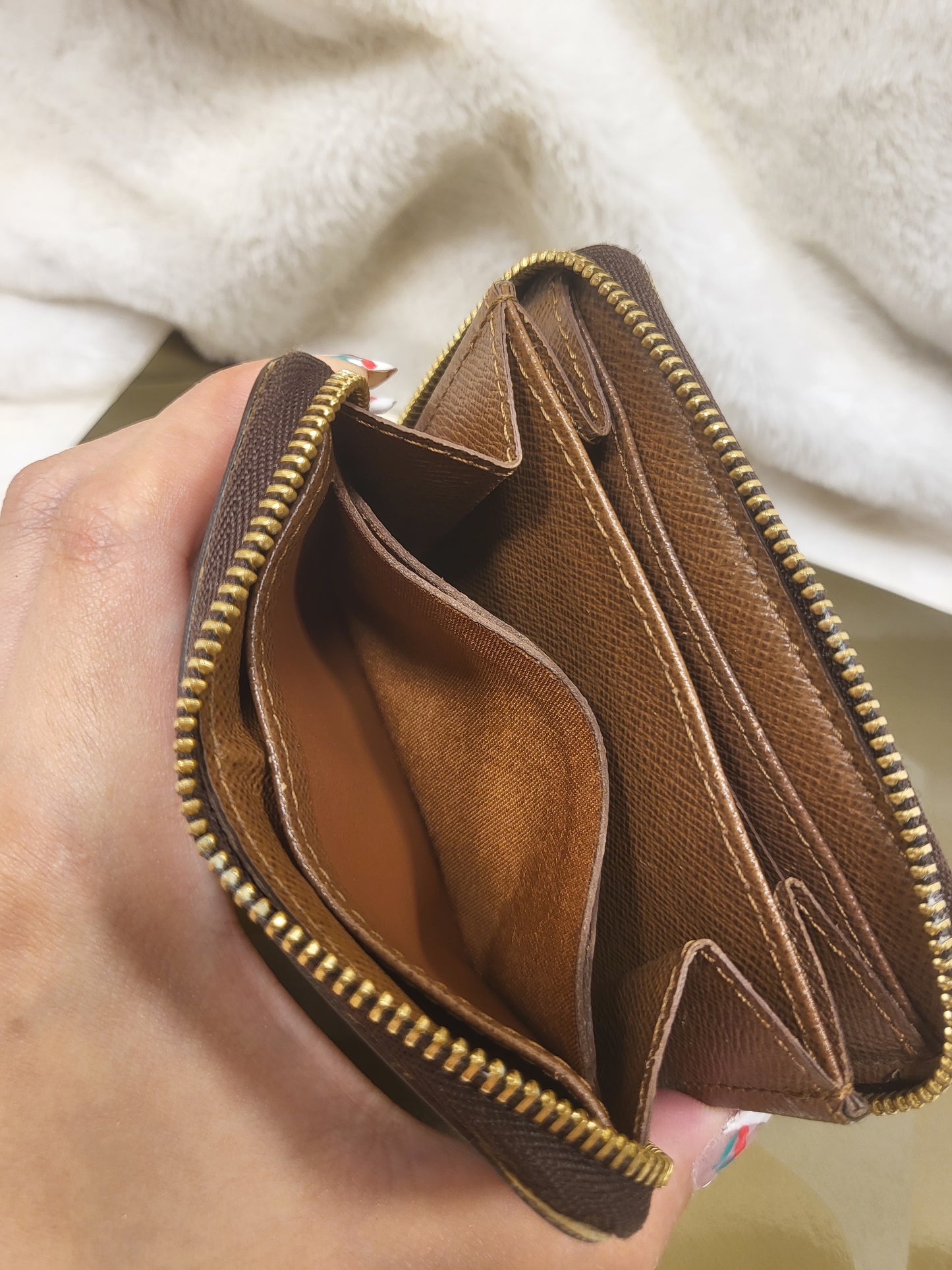 Authentic pre-owned Louis Vuitton compact zippy wallet