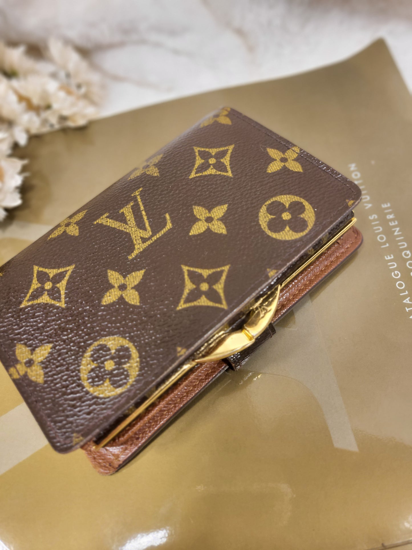 Authentic pre-owned Louis Vuitton kisslock wallet