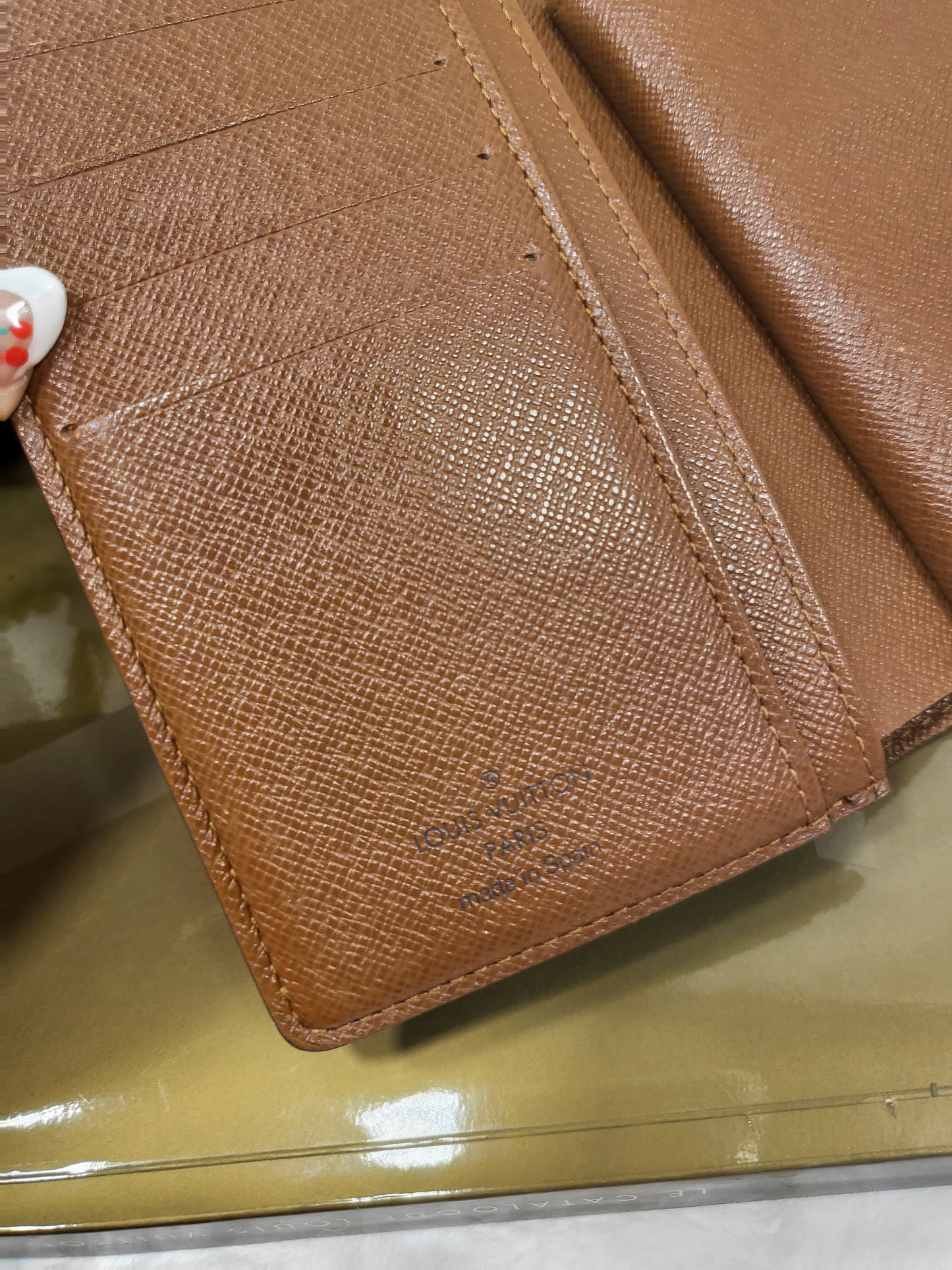 Authentic pre-owned Louis Vuitton kisslock wallet