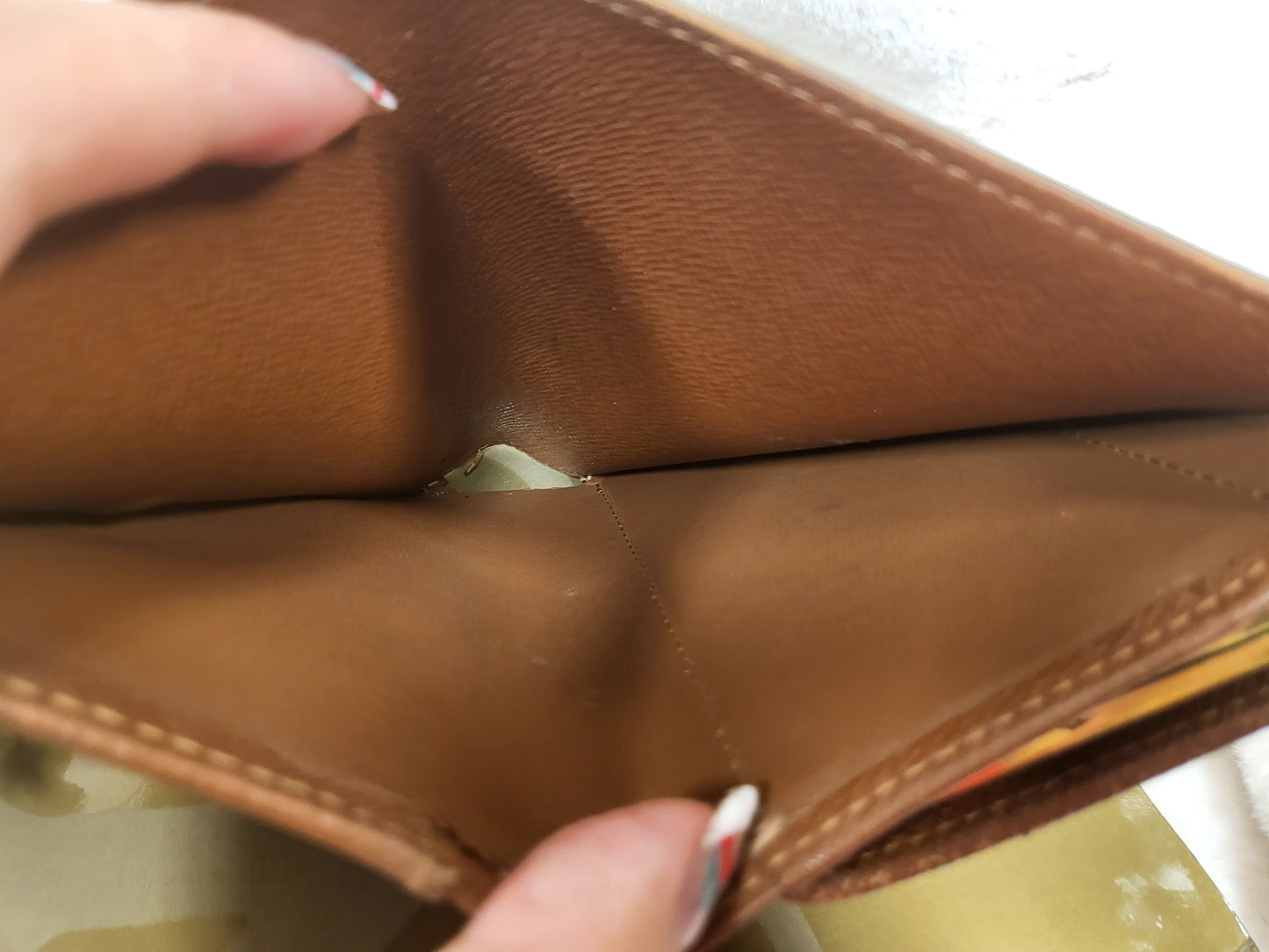 Authentic pre-owned Louis Vuitton kisslock wallet