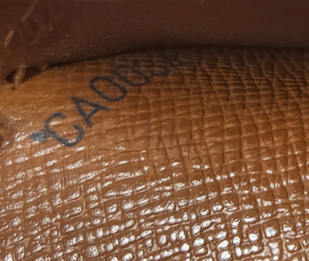 Authentic pre-owned Louis Vuitton kisslock wallet