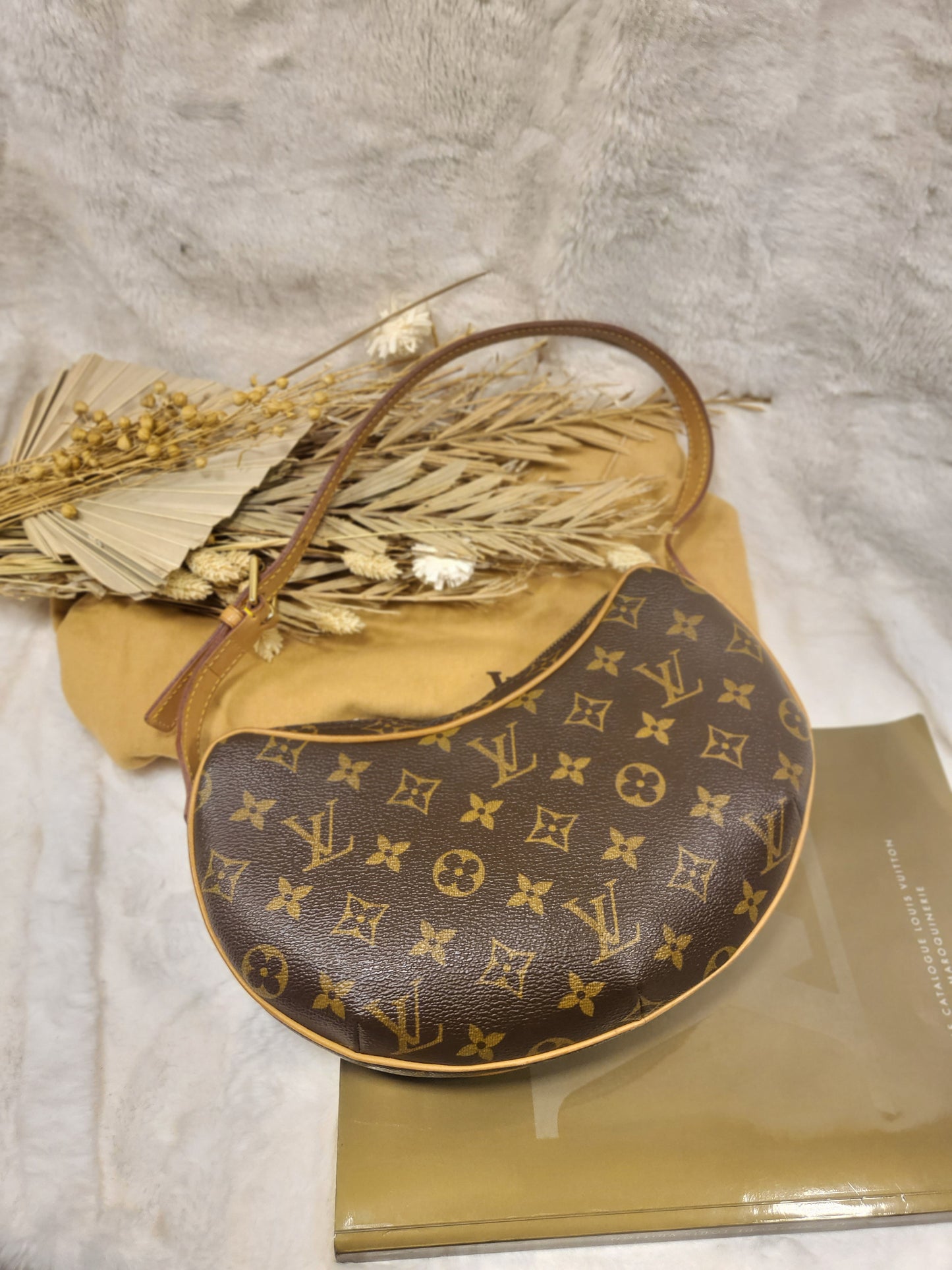 Authentic pre-owned Louis Vuitton Croissant pm