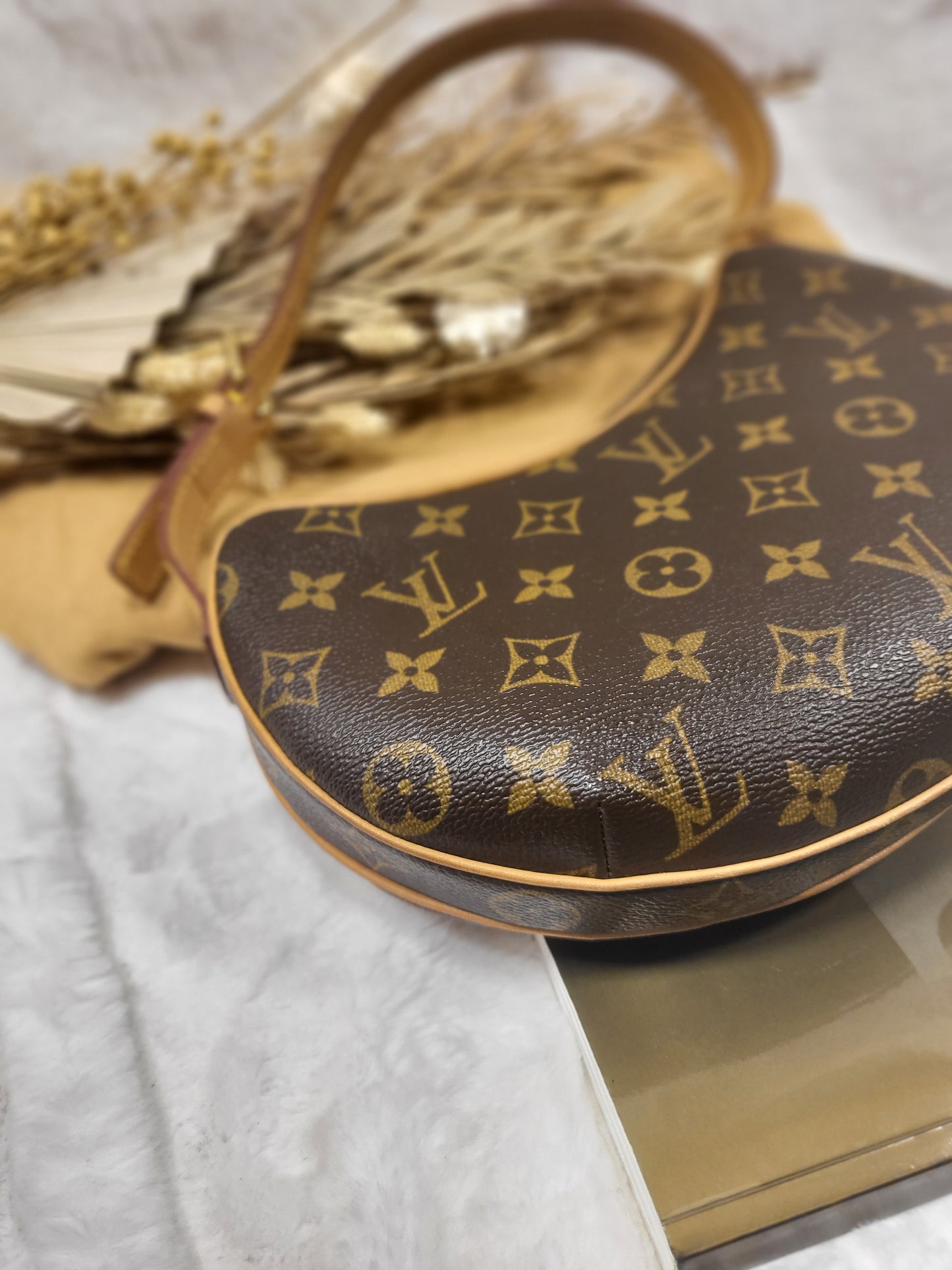 Authentic pre-owned Louis Vuitton Croissant pm