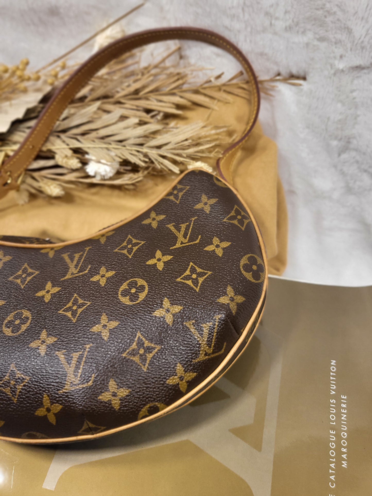 Authentic pre-owned Louis Vuitton Croissant pm