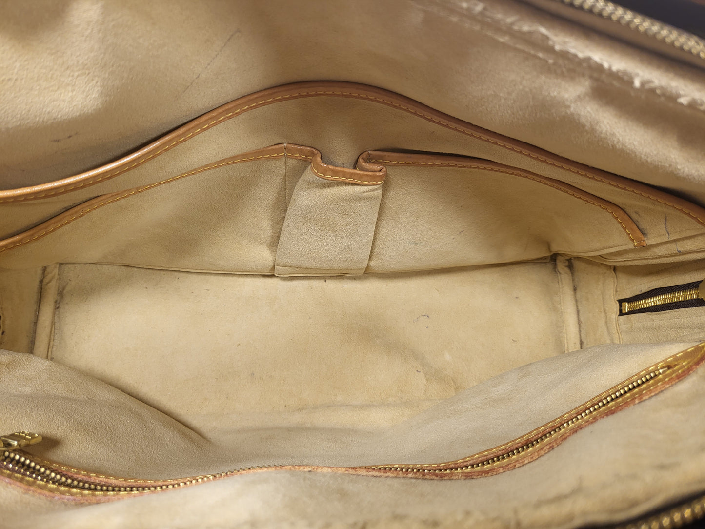 Authentic pre-owned Louis Vuitton Rivoli briefcase