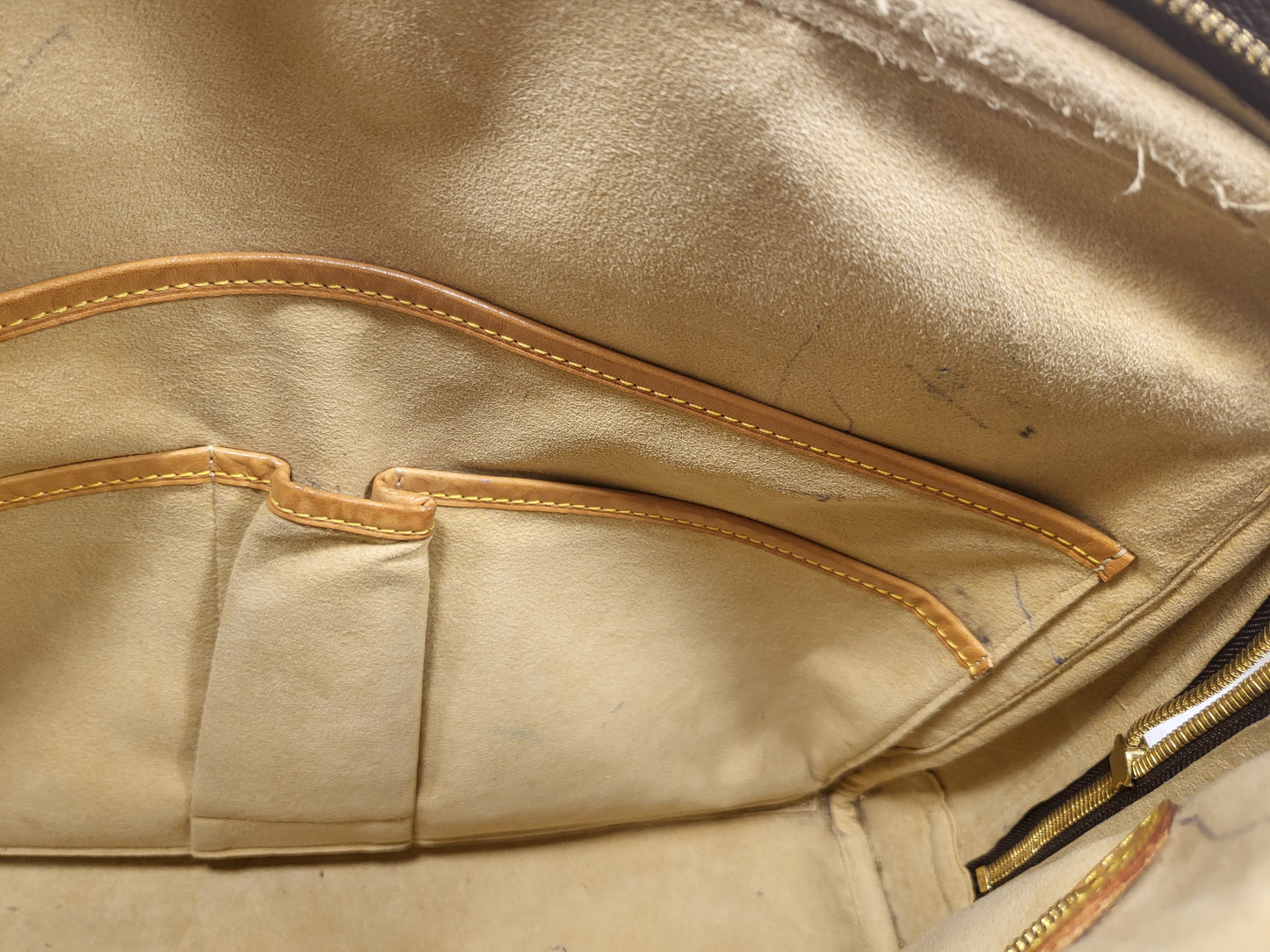Authentic pre-owned Louis Vuitton Rivoli briefcase