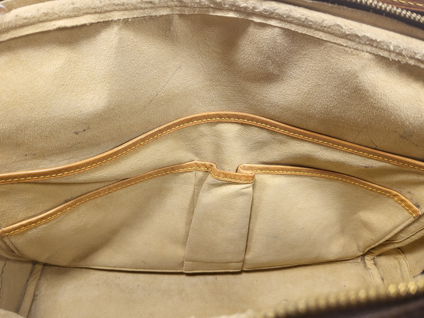 Authentic pre-owned Louis Vuitton Rivoli briefcase