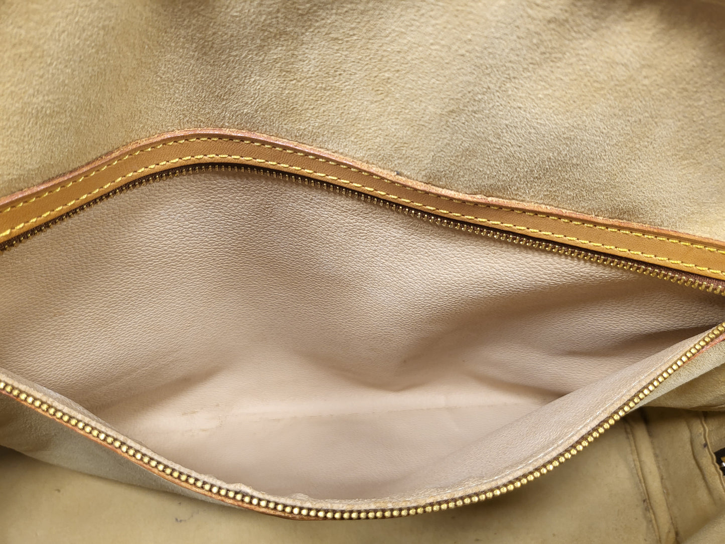 Authentic pre-owned Louis Vuitton Rivoli briefcase