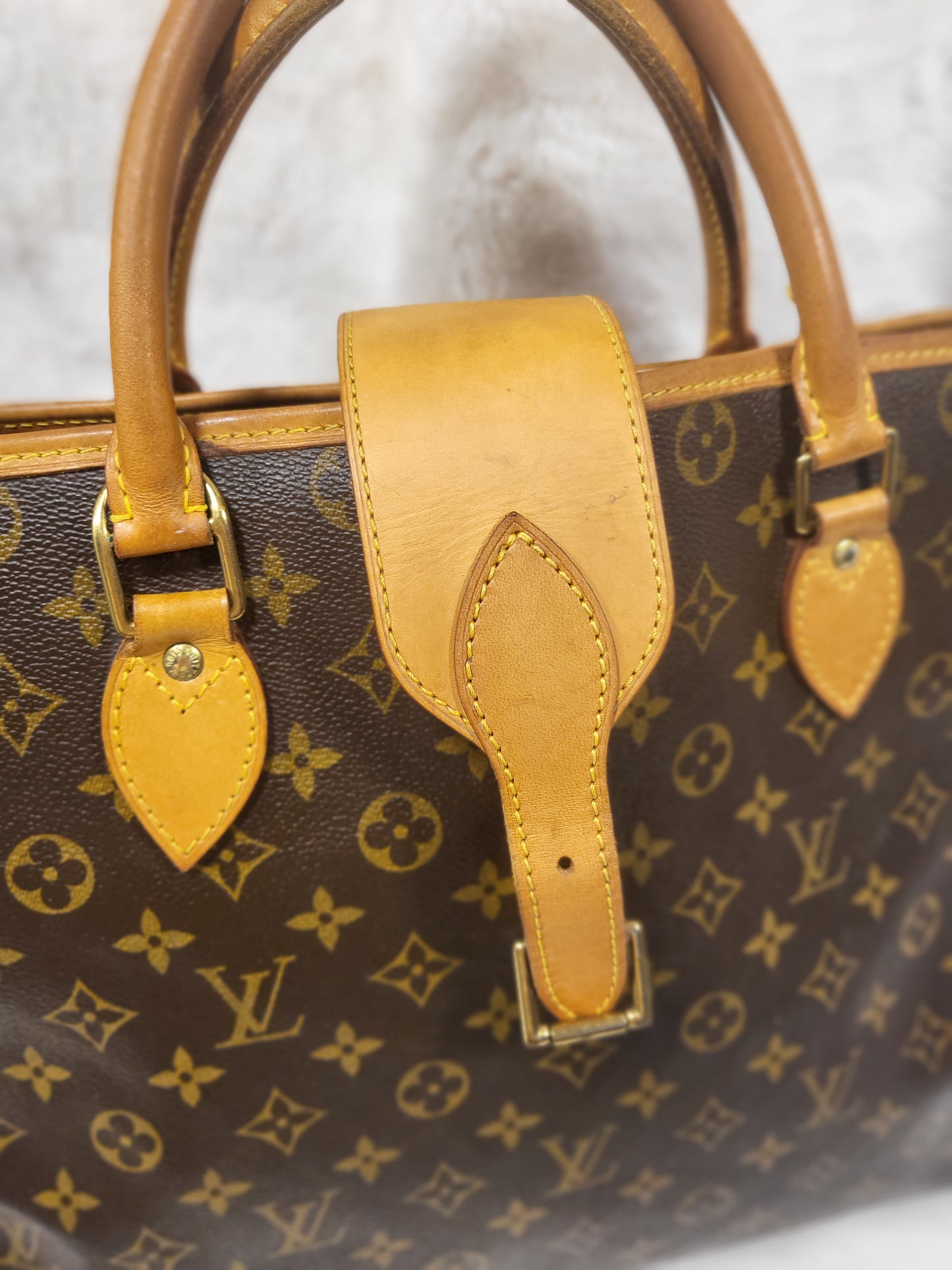Authentic pre-owned Louis Vuitton Rivoli briefcase