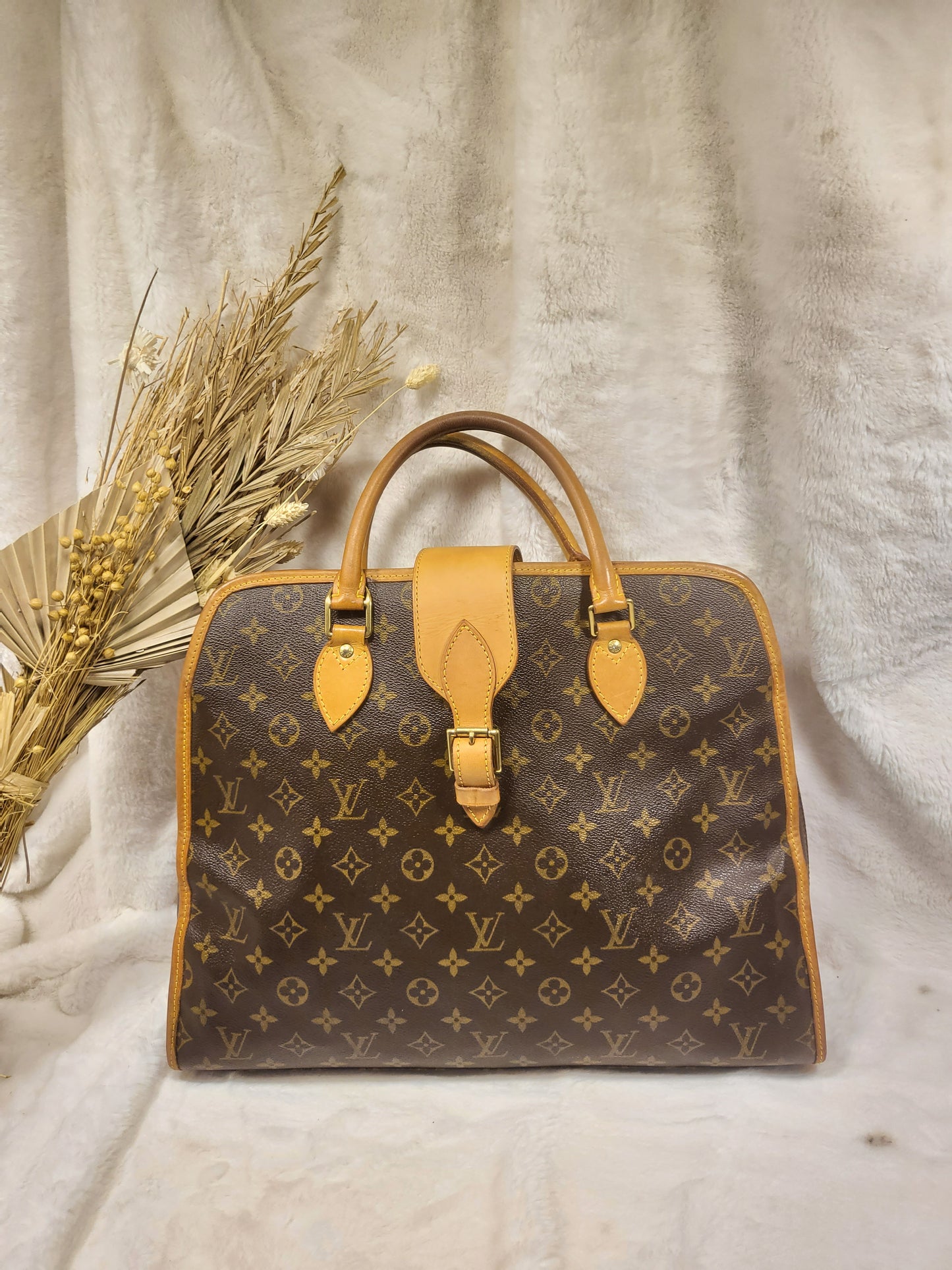 Authentic pre-owned Louis Vuitton Rivoli briefcase