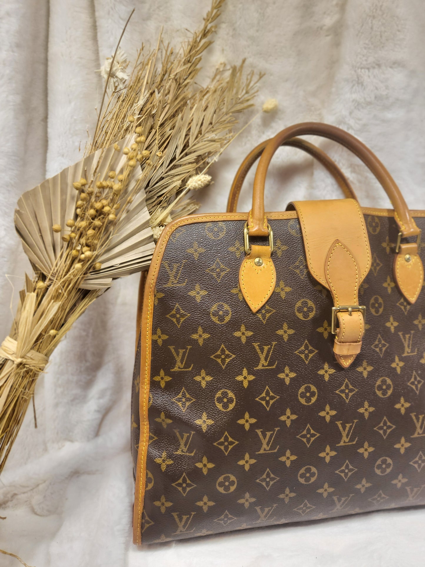 Authentic pre-owned Louis Vuitton Rivoli briefcase