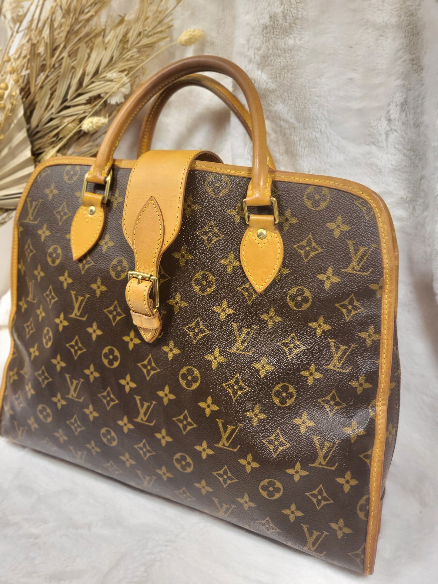 Authentic pre-owned Louis Vuitton Rivoli briefcase