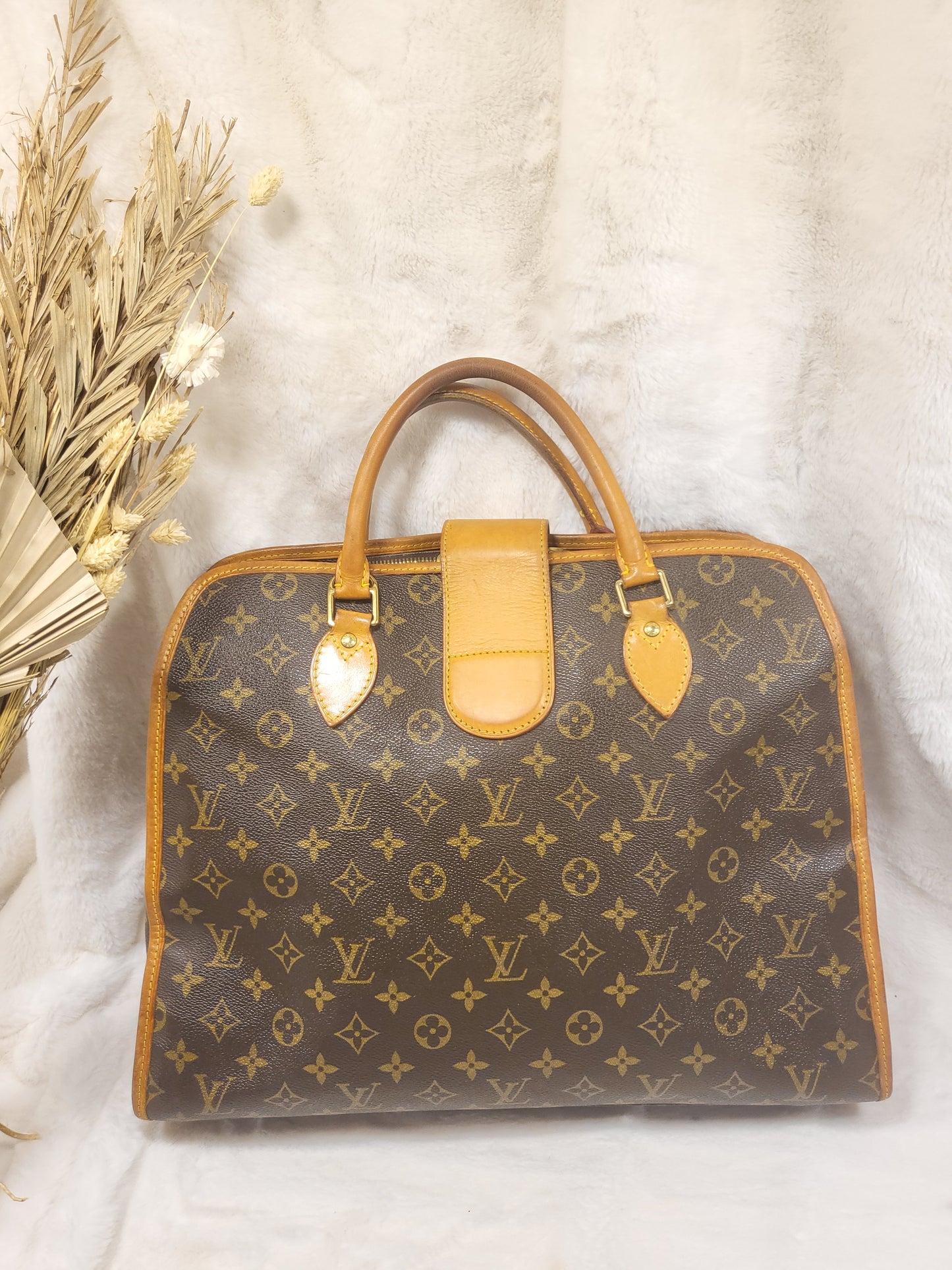 Authentic pre-owned Louis Vuitton Rivoli briefcase