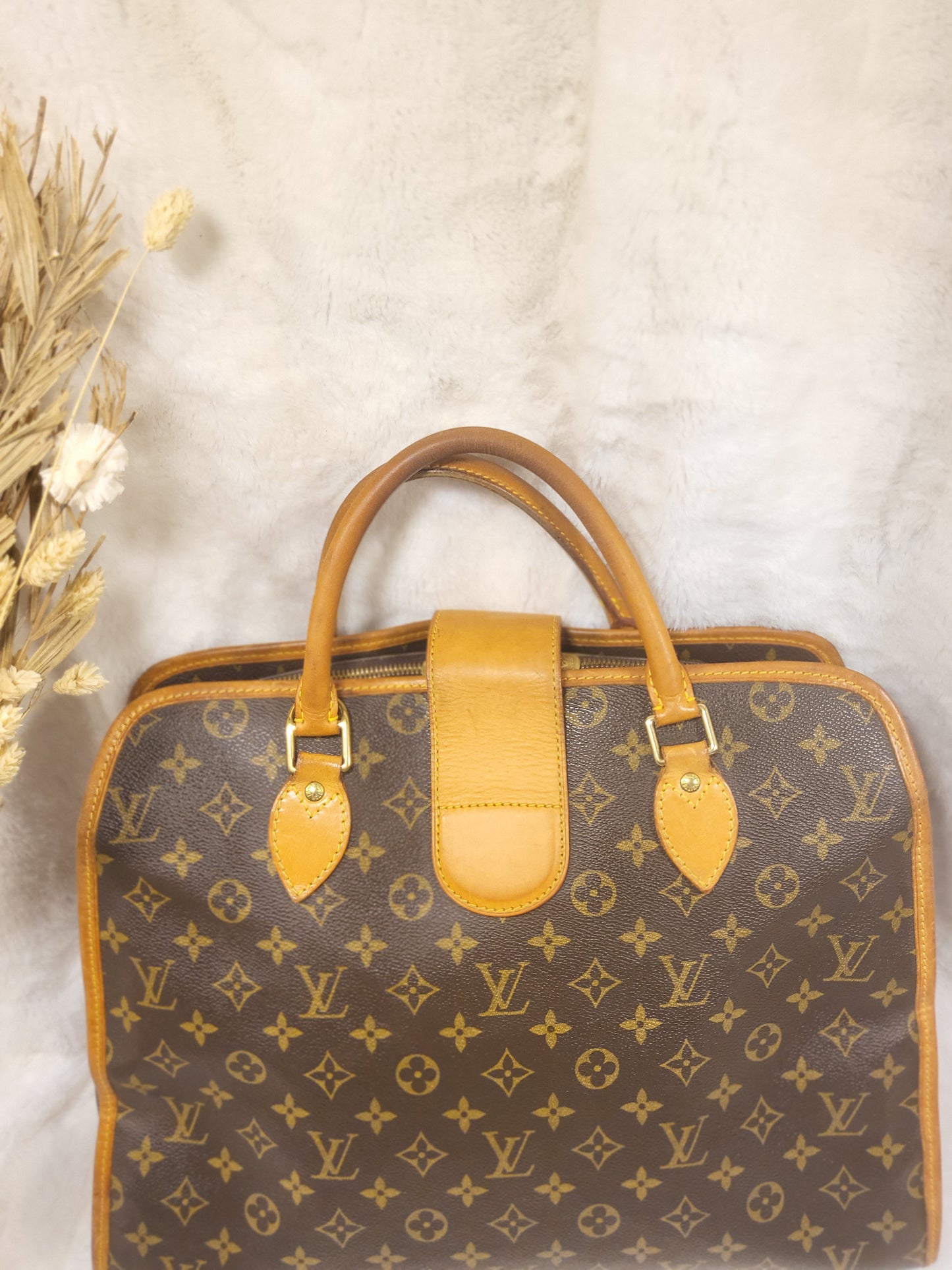 Authentic pre-owned Louis Vuitton Rivoli briefcase