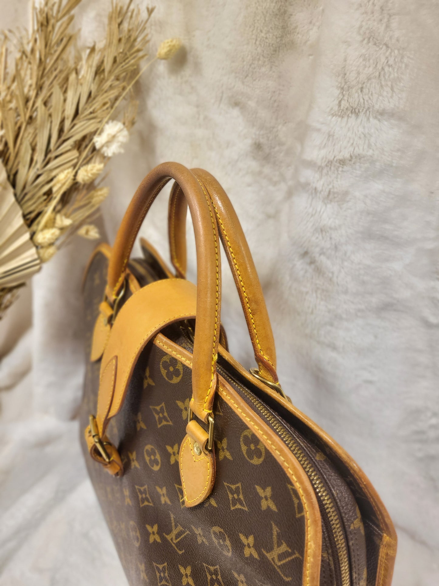 Authentic pre-owned Louis Vuitton Rivoli briefcase