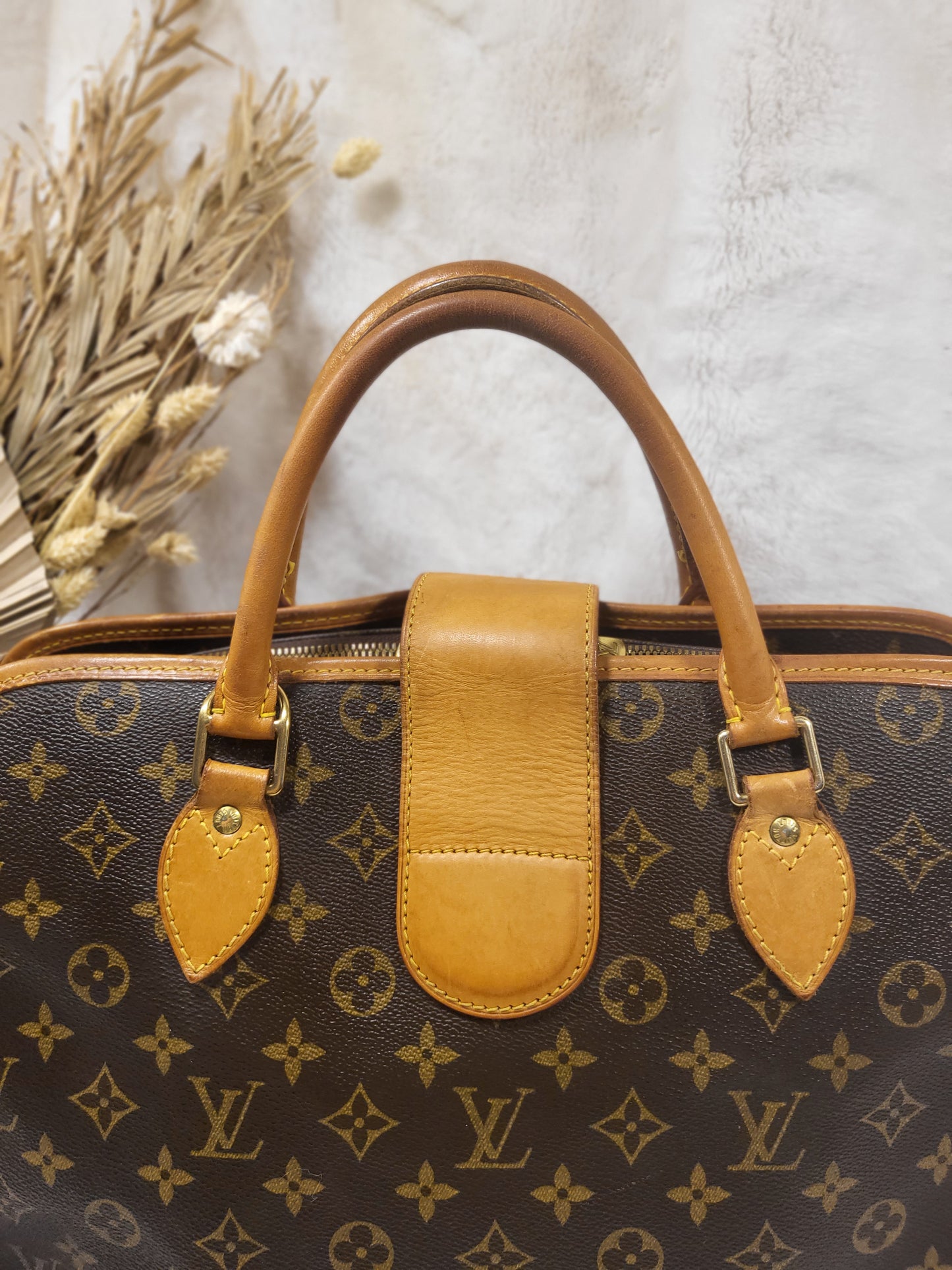 Authentic pre-owned Louis Vuitton Rivoli briefcase
