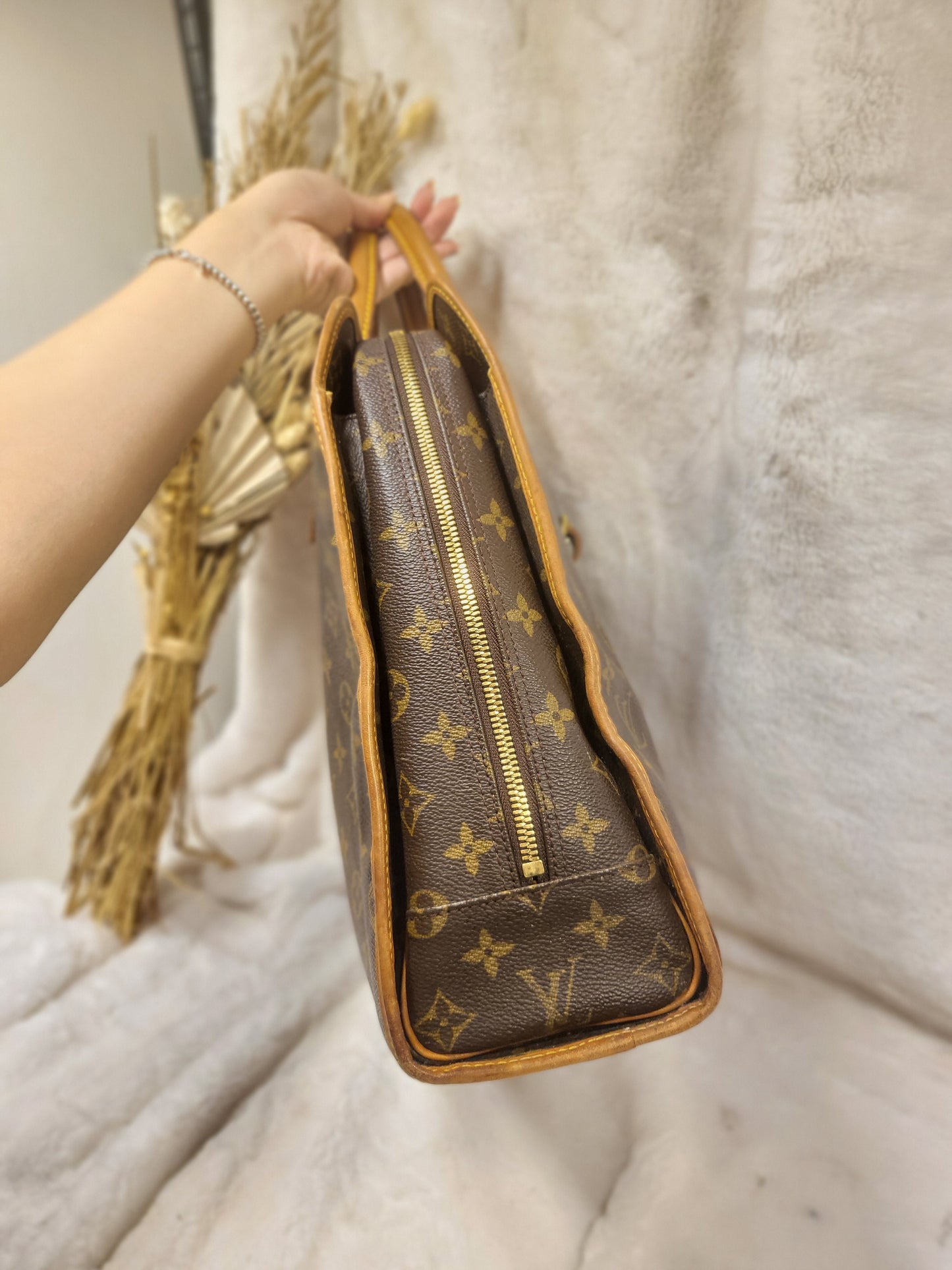 Authentic pre-owned Louis Vuitton Rivoli briefcase