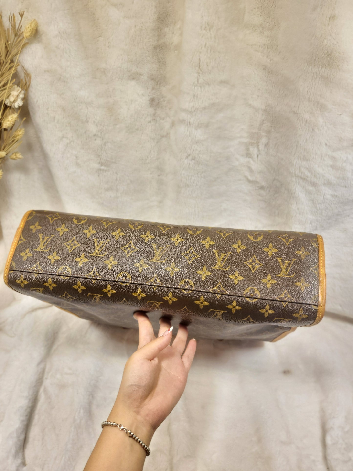 Authentic pre-owned Louis Vuitton Rivoli briefcase