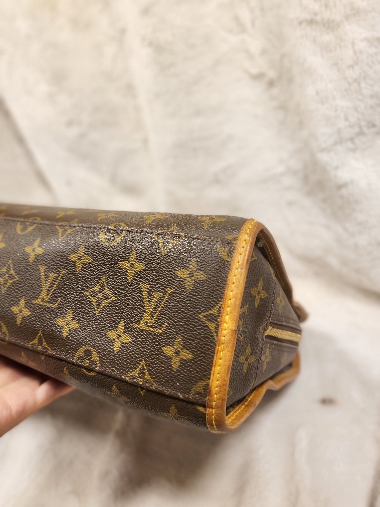 Authentic pre-owned Louis Vuitton Rivoli briefcase