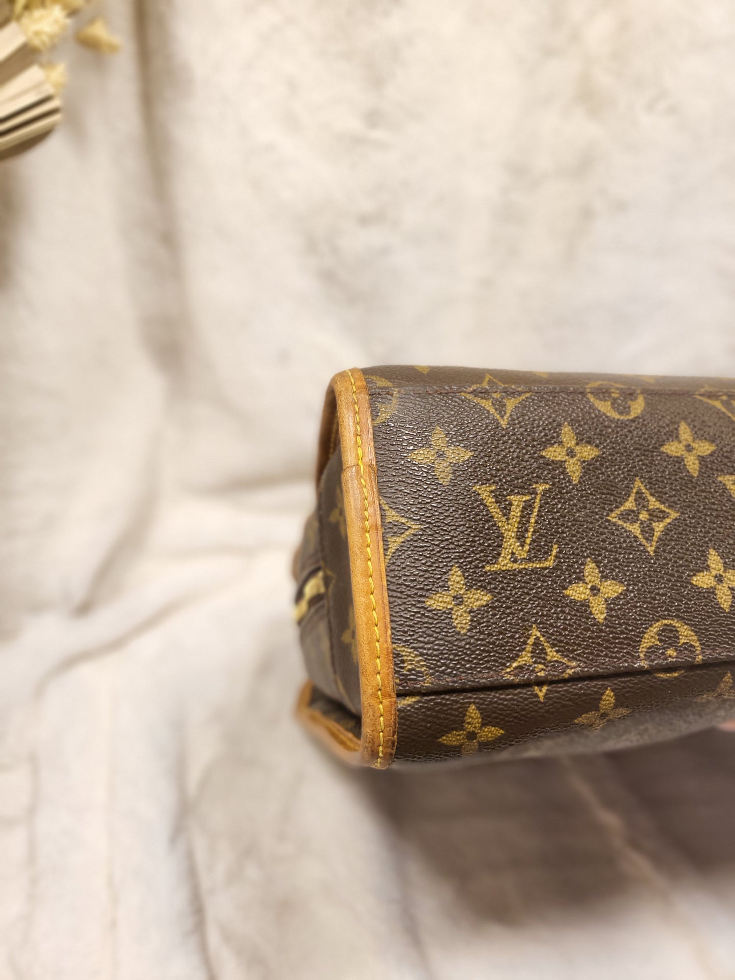 Authentic pre-owned Louis Vuitton Rivoli briefcase