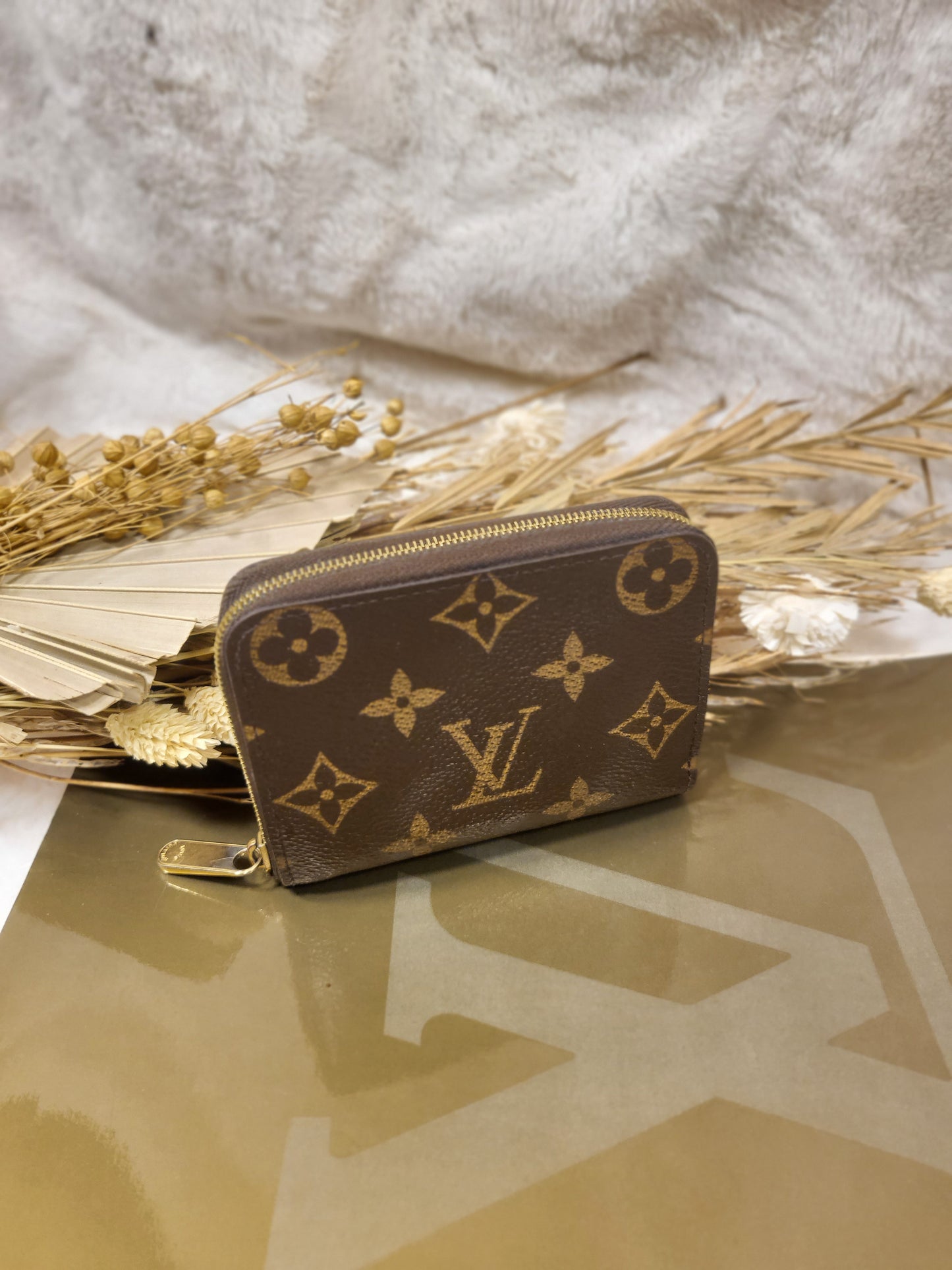 Authentic pre-owned Louis Vuitton compact zippy wallet