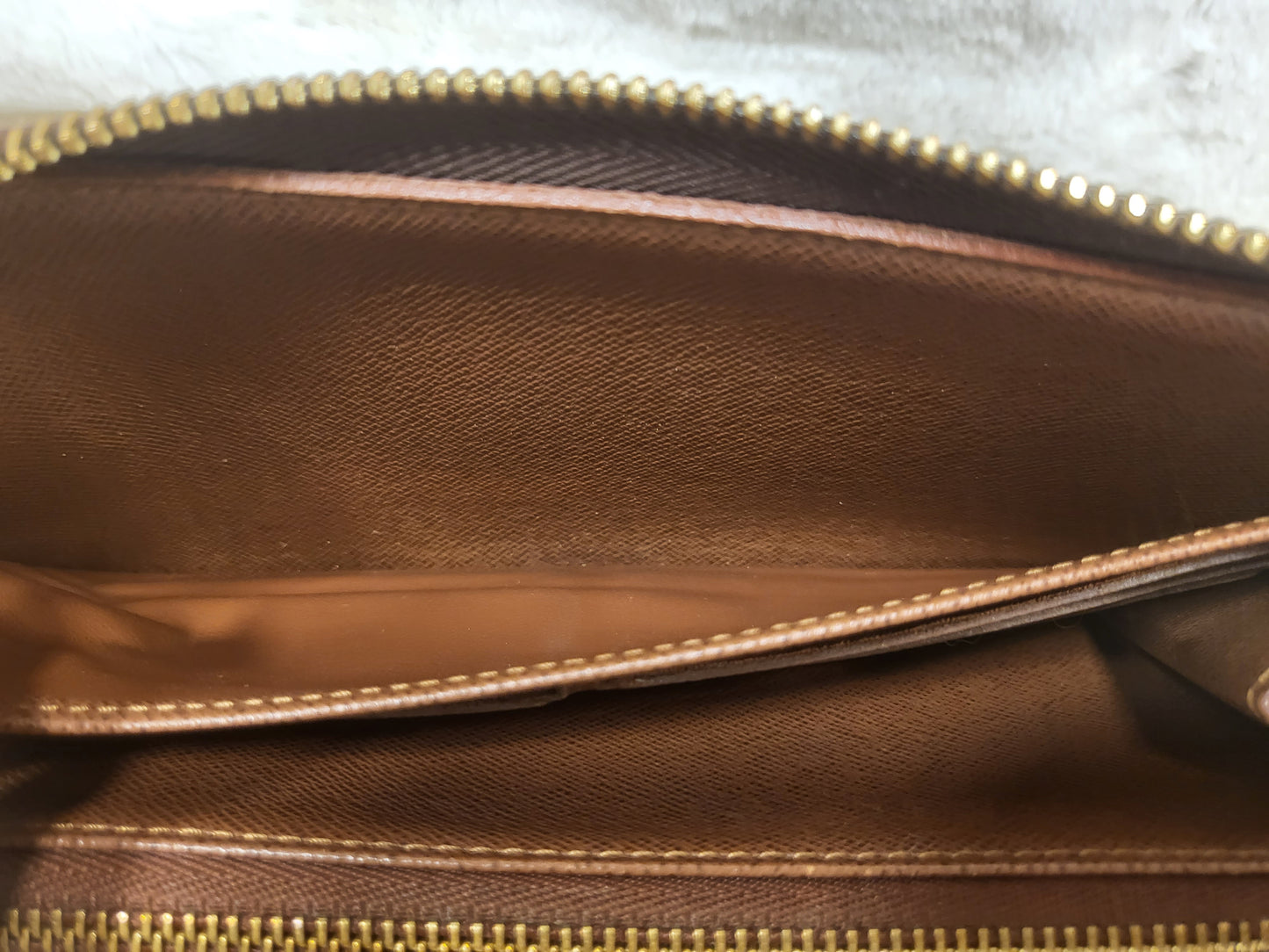 Authentic pre-owned Louis Vuitton zippy travel organizer