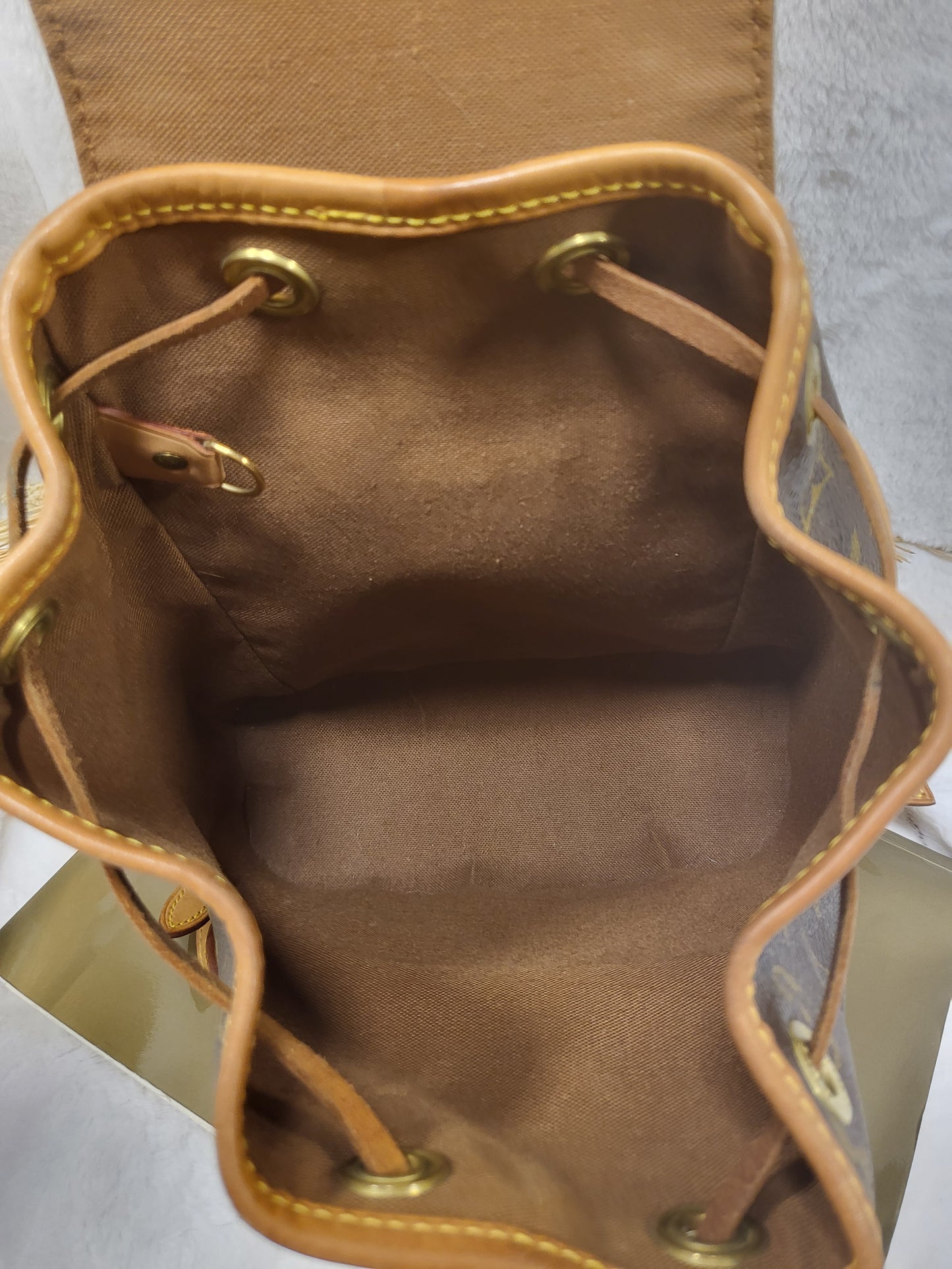 Authentic pre-owned Louis Vuitton Montsouris mini pm backpack