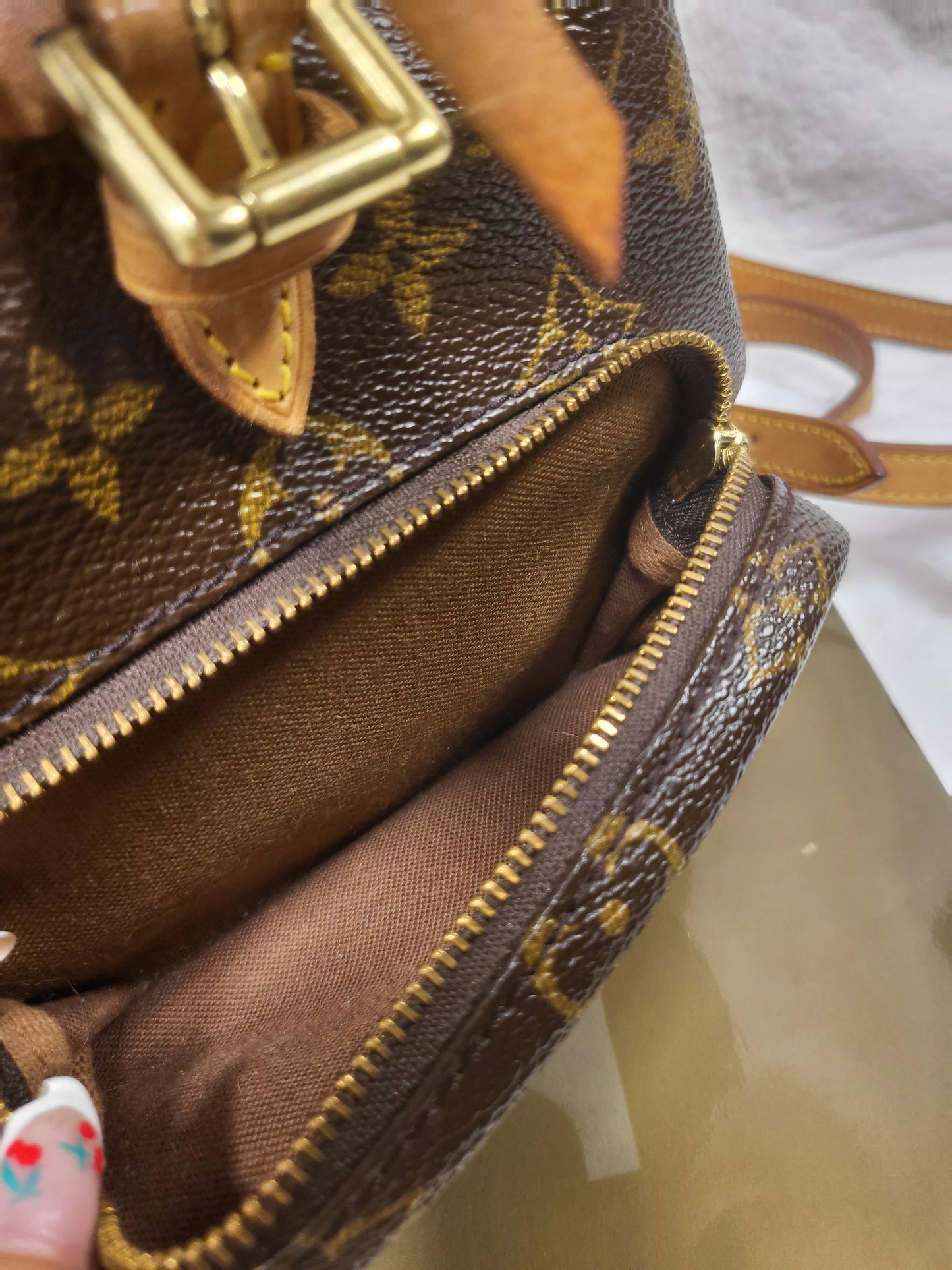 Authentic pre-owned Louis Vuitton Montsouris mini pm backpack