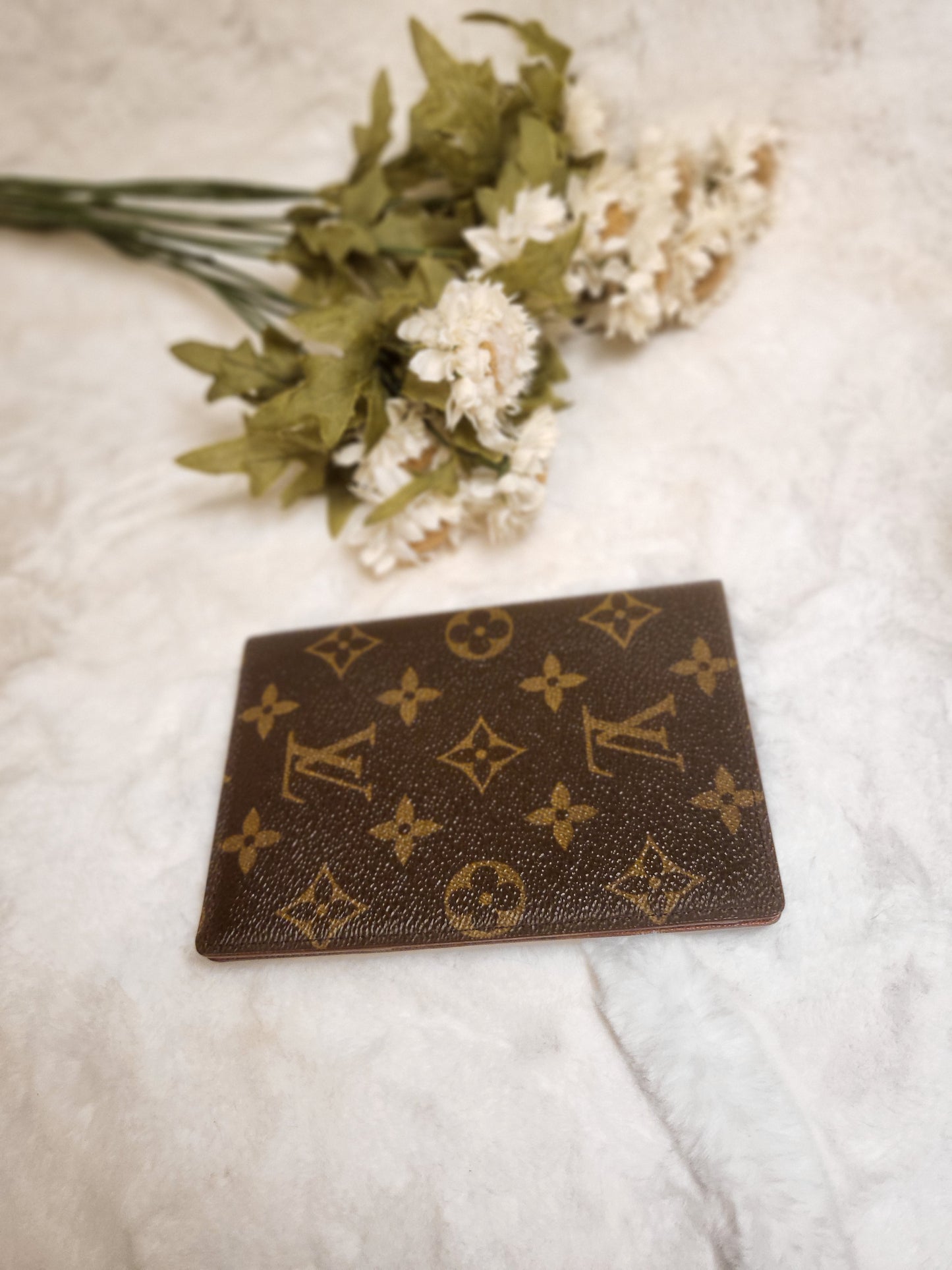 Authentic pre-owned Louis Vuitton passport holder