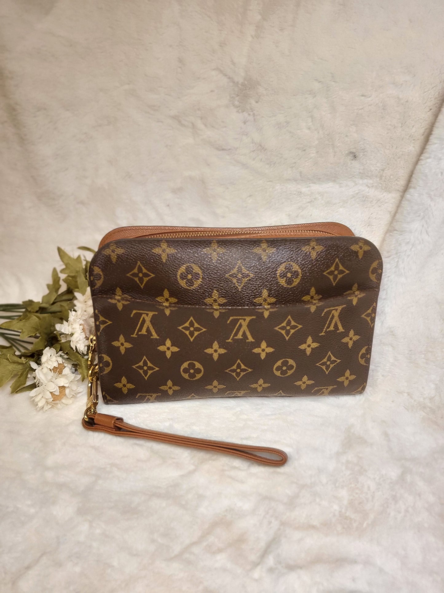 Authentic pre-owned Louis Vuitton Orsay monogram clutch