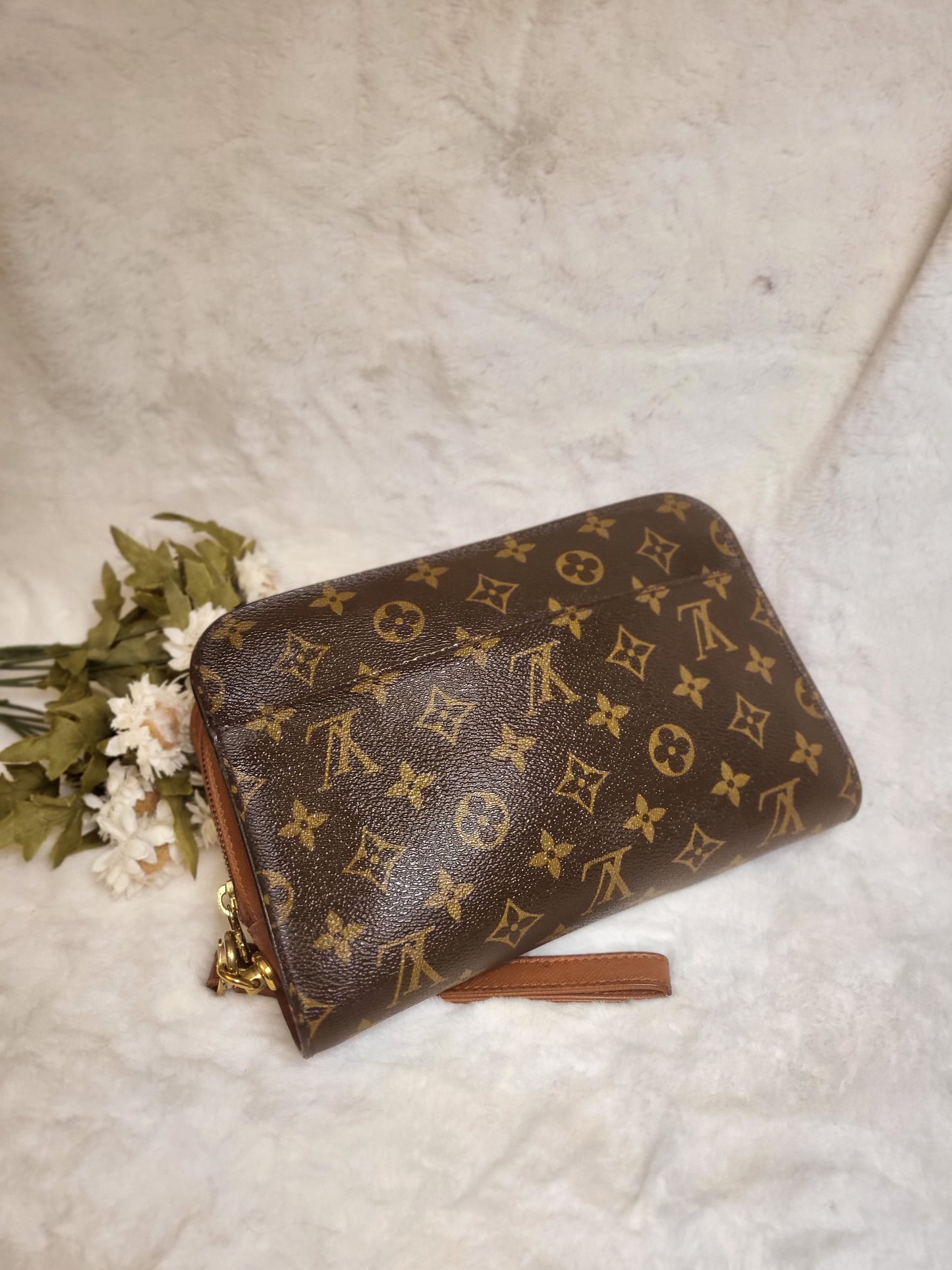 Authentic pre-owned Louis Vuitton Orsay monogram clutch